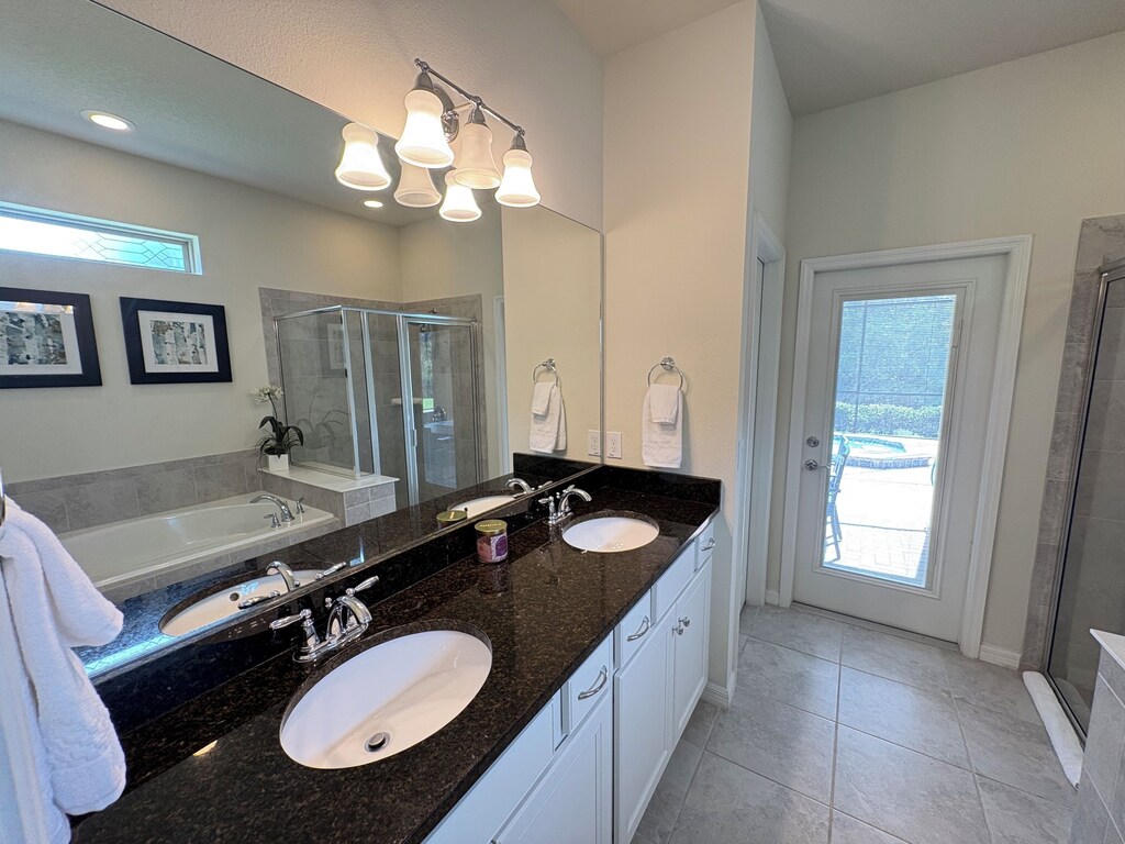 Separate entrance to the lanai from the Master bath with built-in privacy shade