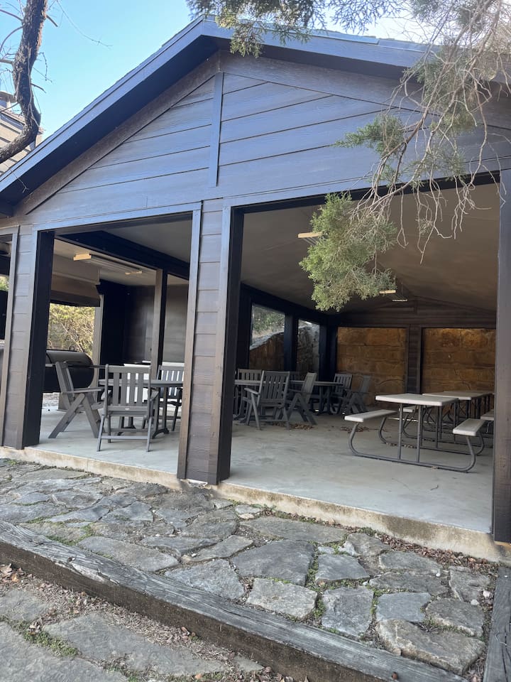 Common area with large grill and picnic tables