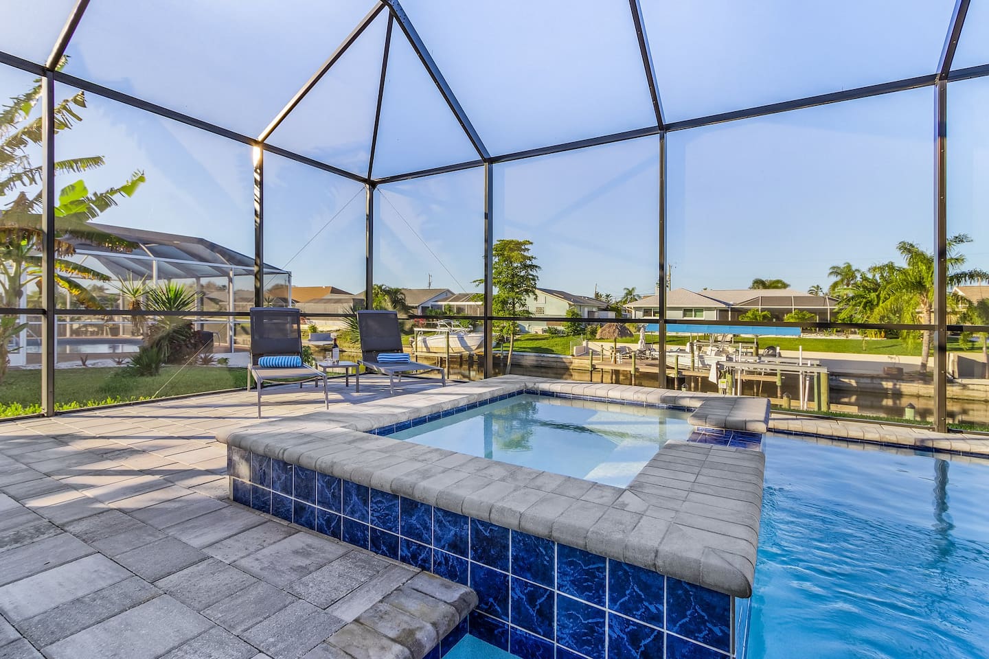 Relax and soak up the sun in the spacious lounging area with a refreshing spa!