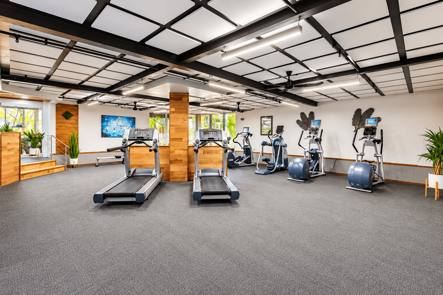 Adult-only fitness center beneath the lagoon waterfall
