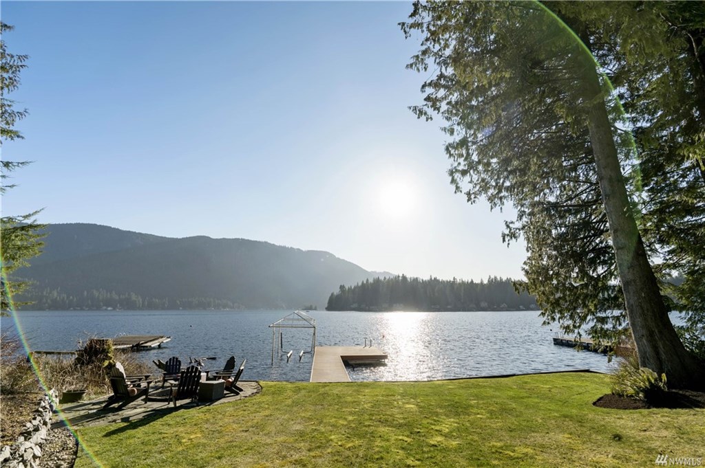 Relax on the back porch and take in the serene lake vista.