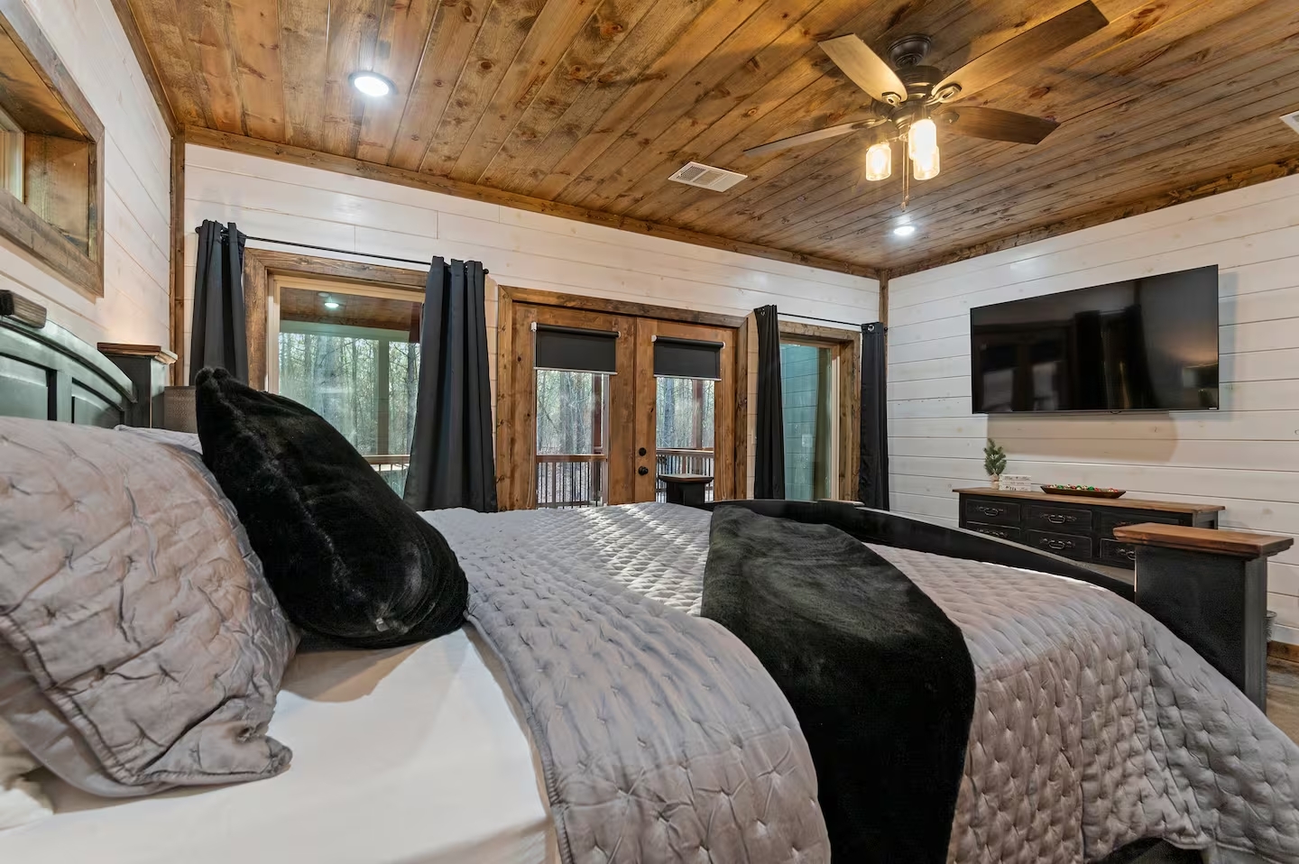 Thoughtful design meets comfort in every corner — from smart TVs to luxury linens and calming forest views.