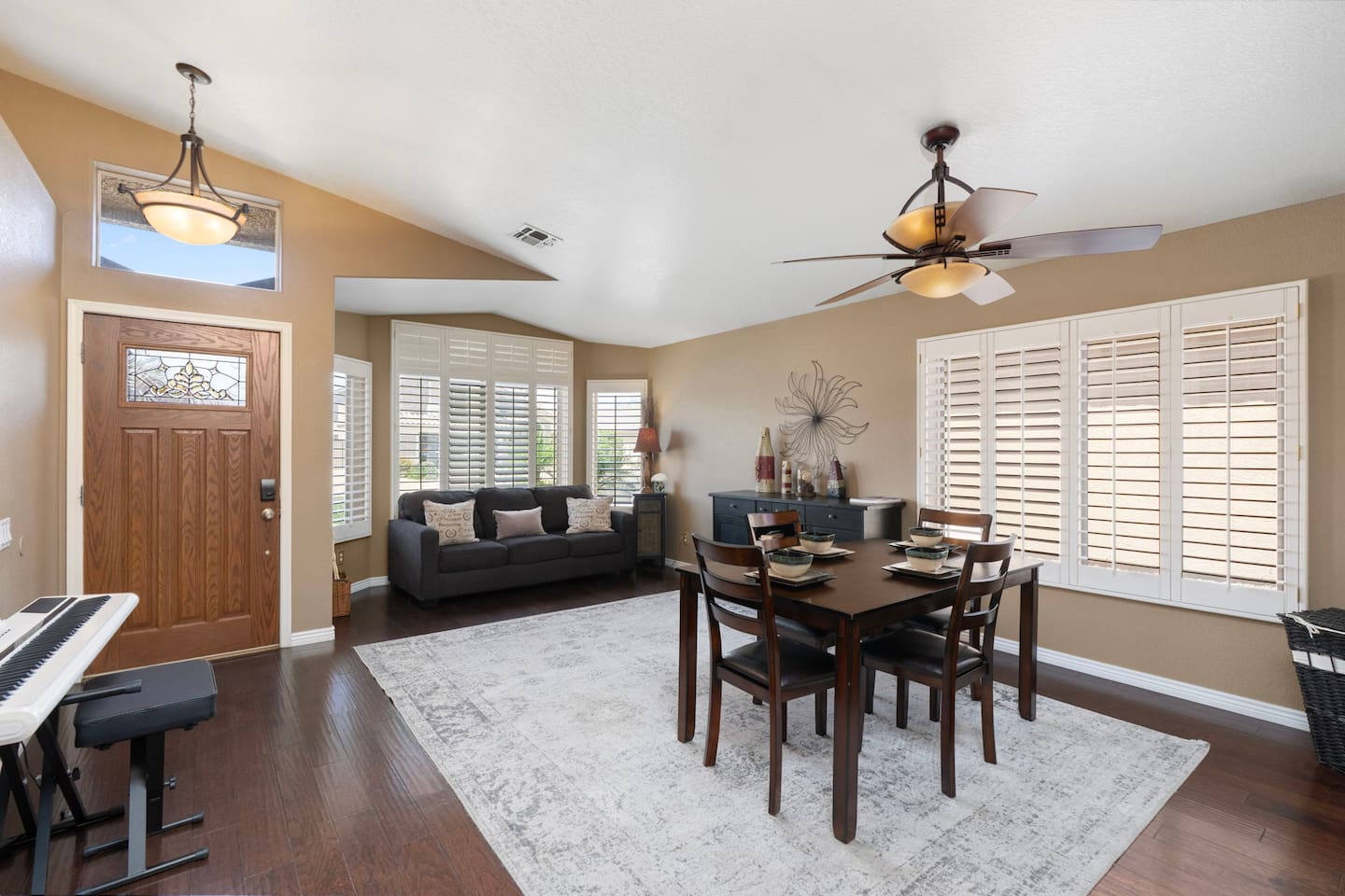  From the front door to the dining table to the cozy sitting area, the flow of this space invites you to settle in and feel at home from the moment you arrive.