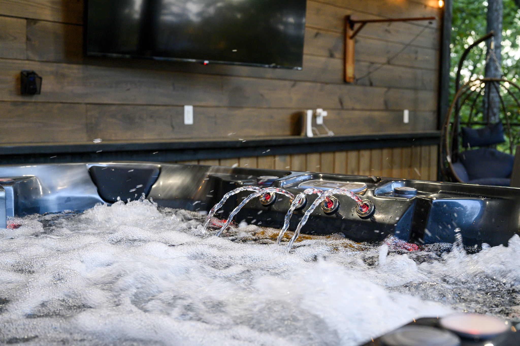 Unwind in the hot tub after a day in Broken Bow, surrounded by trees, fresh air, and total relaxation.