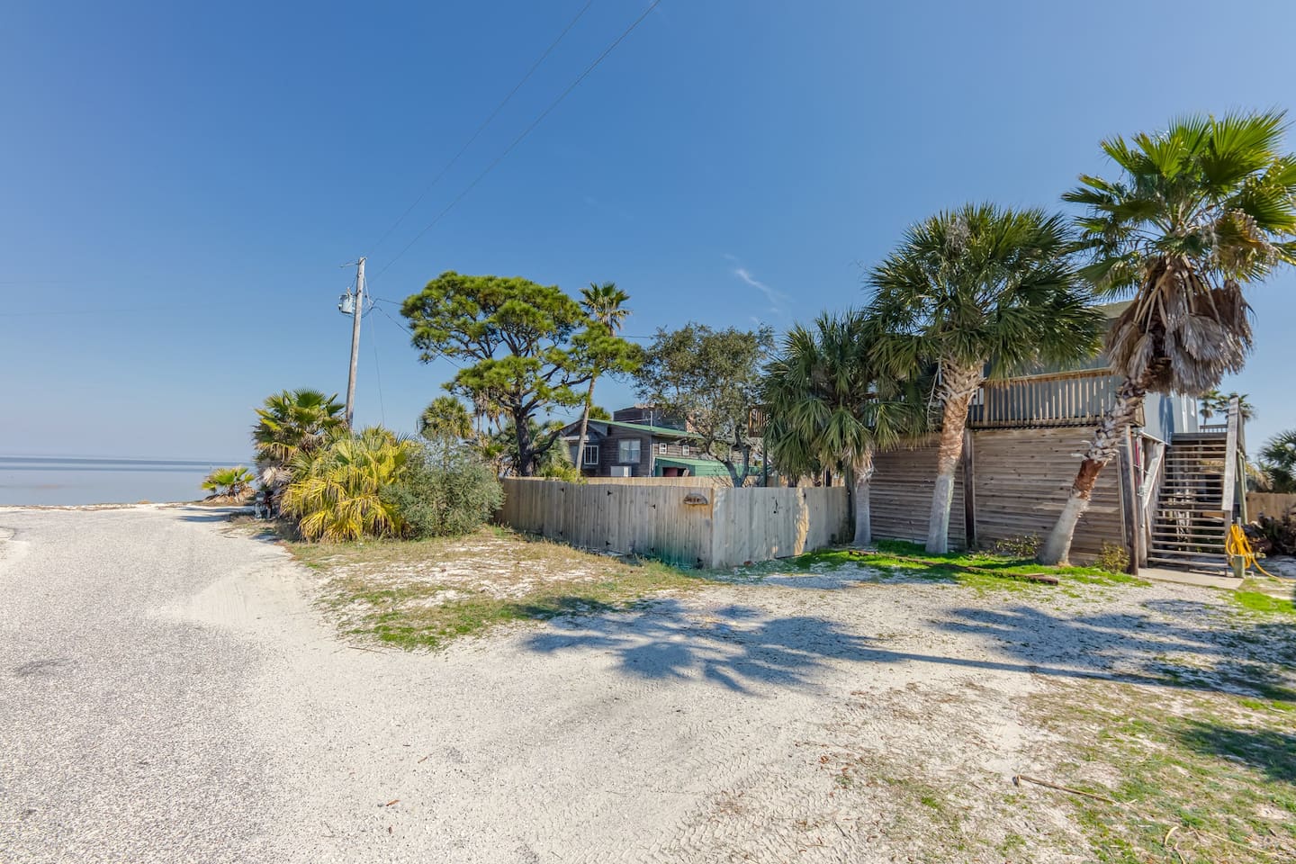 Outdoor Oasis: Step into paradise with palm trees and stunning coastal views just outside your door!