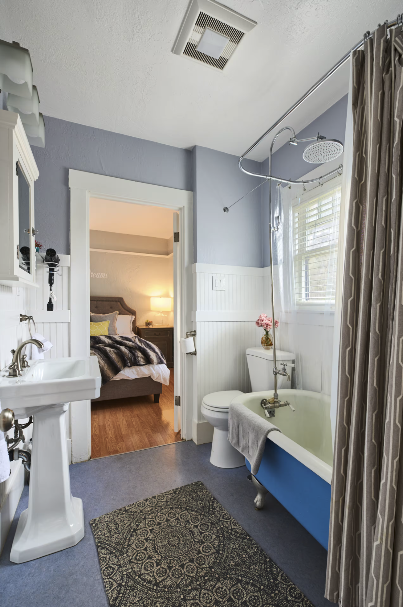 Jack and Jill Ensuite Bath to Bedroom and Livingroom. Deep soaking clawfoot tub.