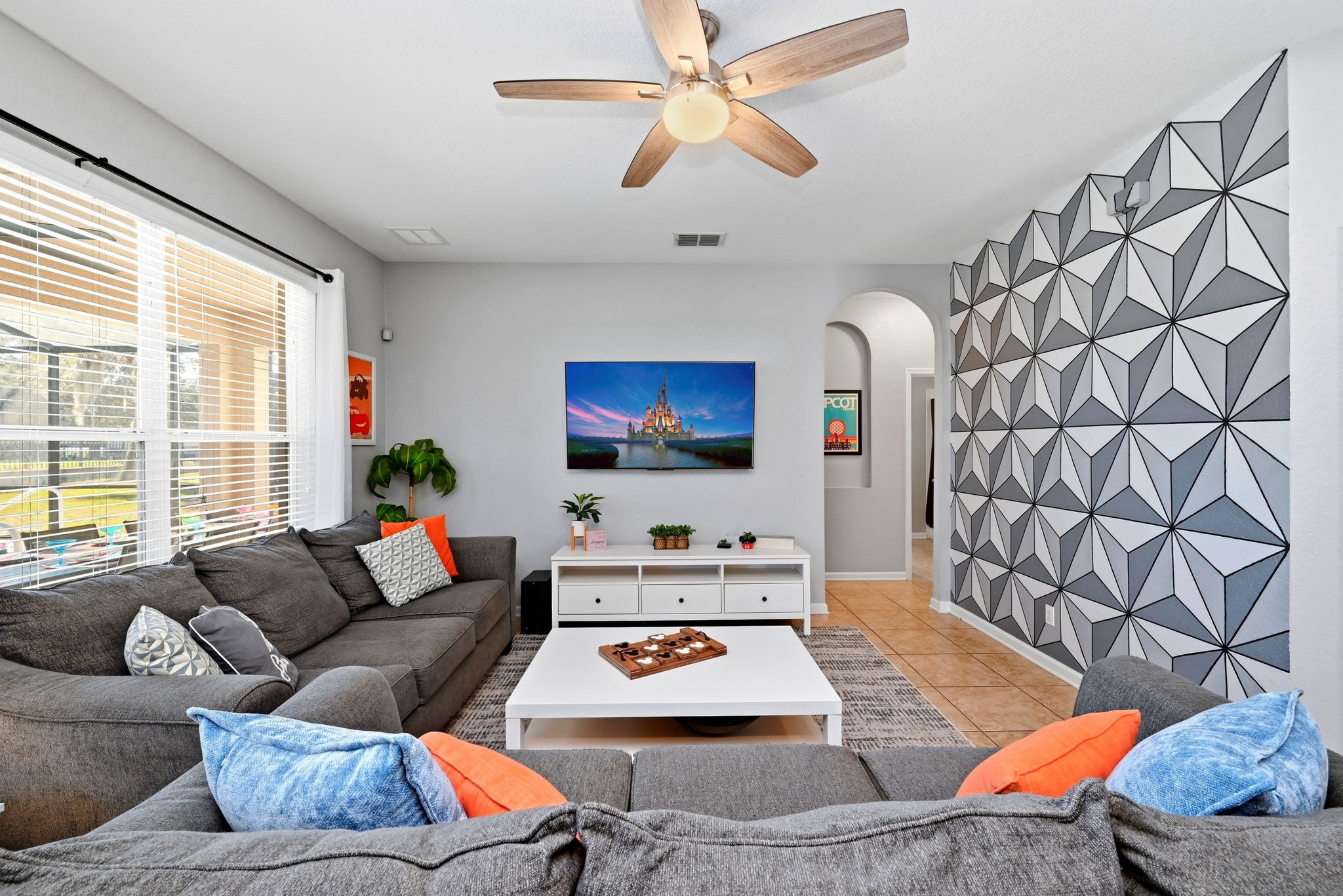 Watch TV, play games, or just relax in our Epcot Themed family room