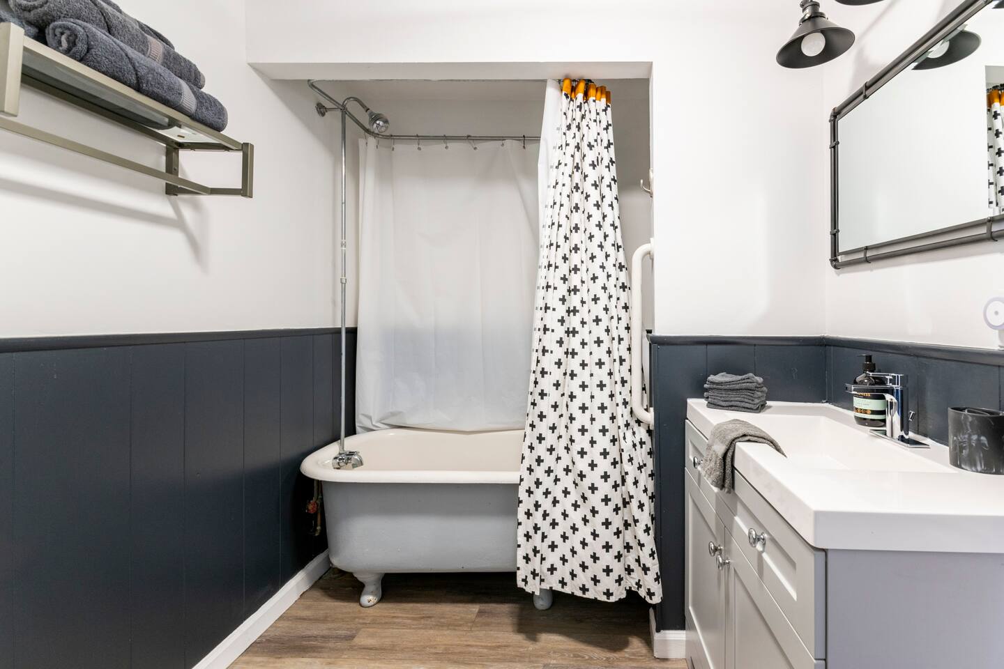 2nd bathroom with shower and freestanding tub.