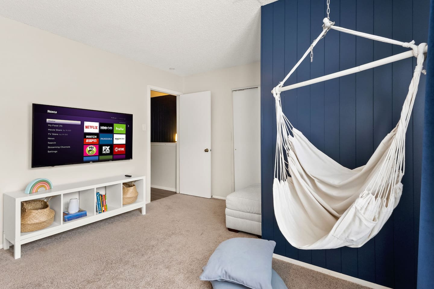 Curl up on the hanging chair and enjoy a family movie evening.