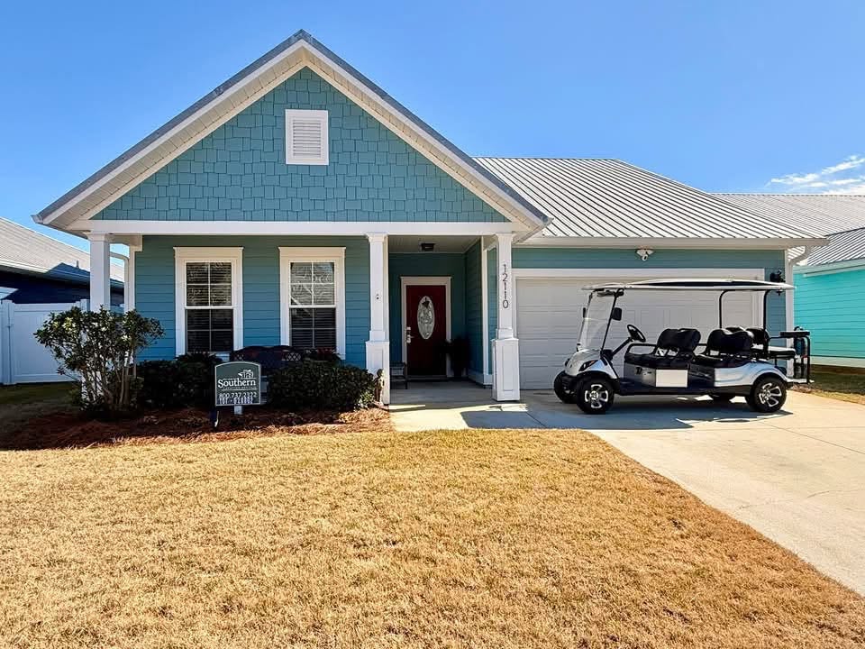 Panama City Beach home with free 6-seater golf cart; walk or cart to the beach.