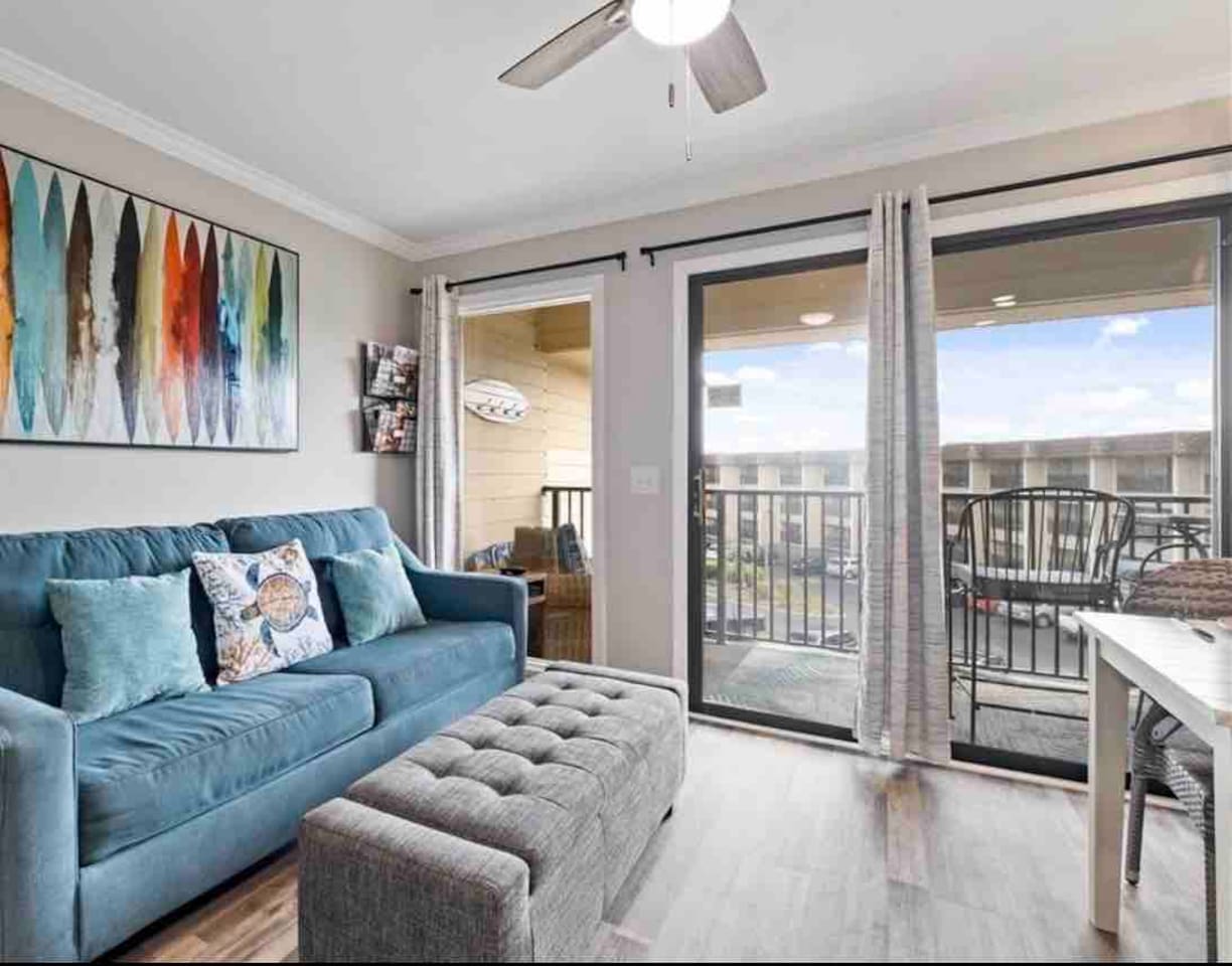 Living room with sofa and ottoman