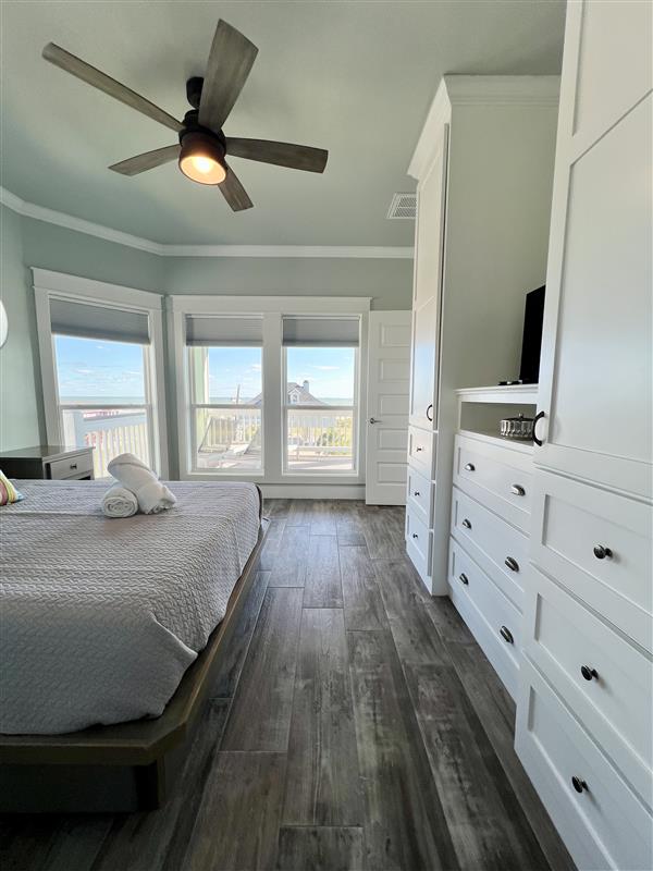 Crystal Paradise Bedroom 4: Elegant queen bedroom offering ensuite convenience and restful space for two.