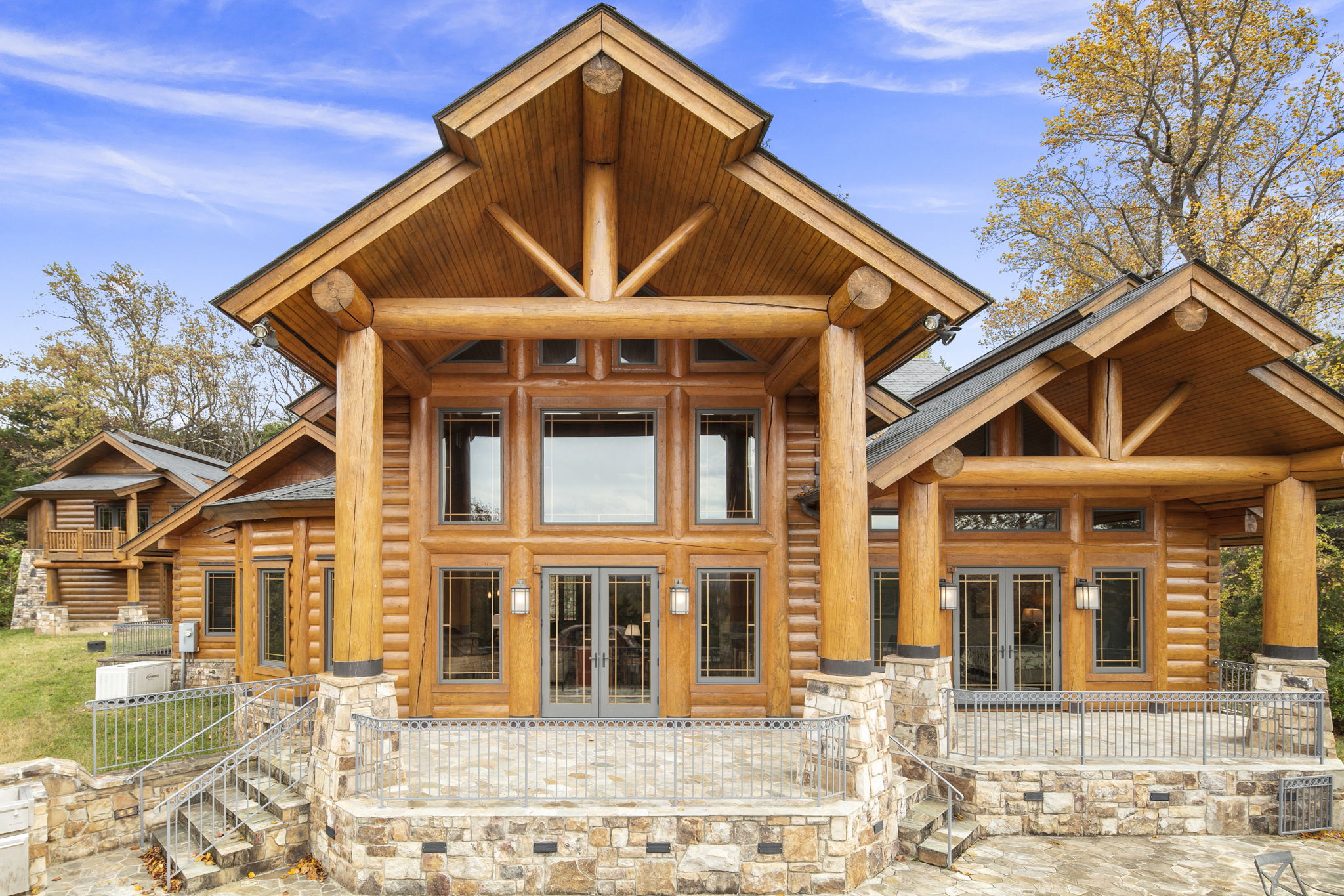 Covered rear patio with high windows, massive room for get-togethers