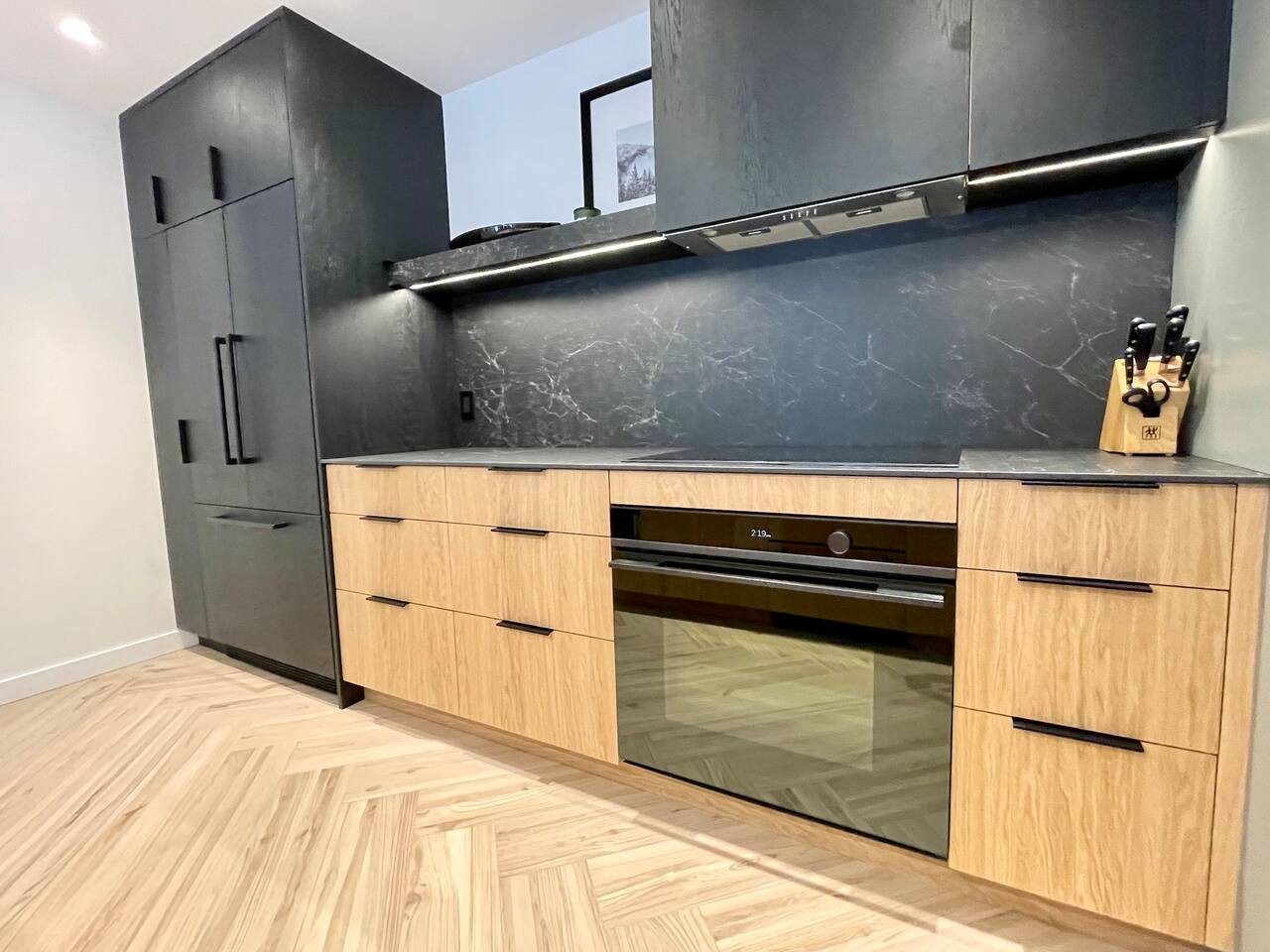 Gourmet grade kitchen offers tons of prep & service space + Fisher Paykel Appliance Package w/Convection Oven, Induction Cooktop, Refrigerator w/icemaker & Dual Drawer Dishwashers. Dedicated beverage fridge & microwave complete the offering.