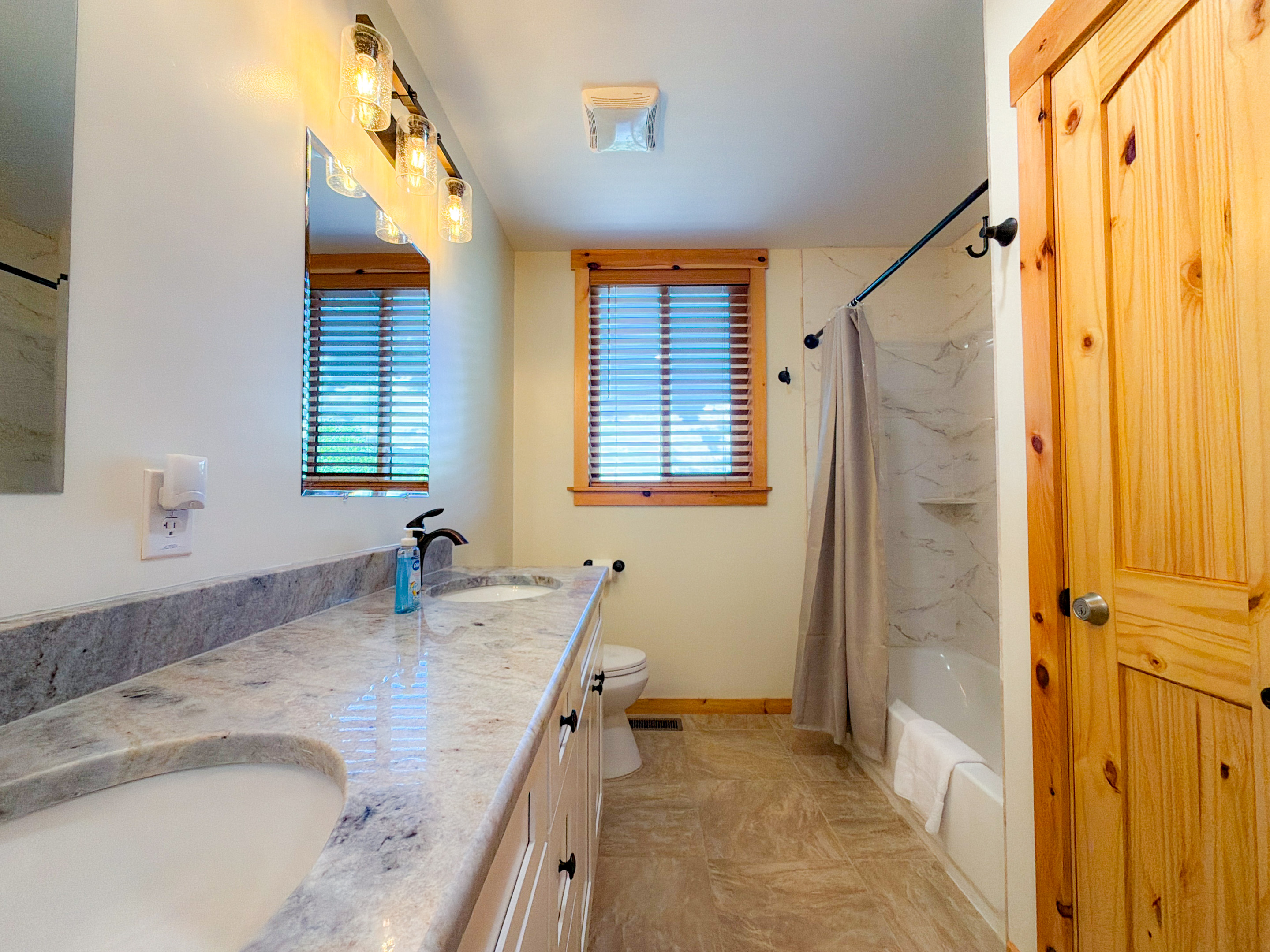 double vanity and plenty of space in the guest bathroom.