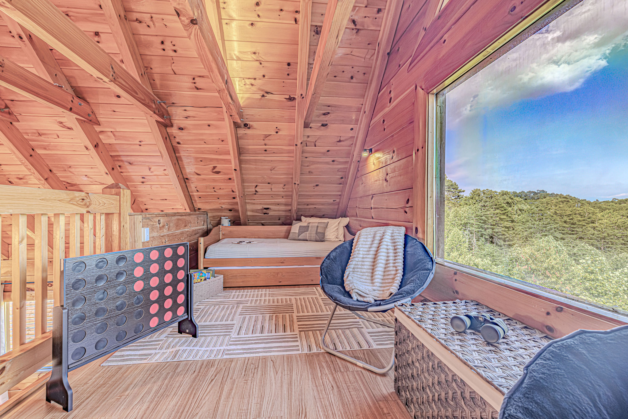 Kids paradise. Mountain views, games galore, and a cozy trundle bed.
