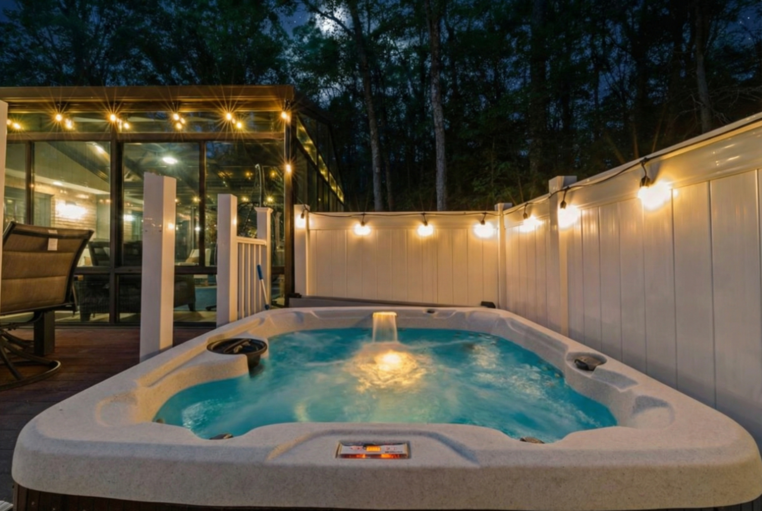 Soak away your worries in your own private fenced-in hot tub, right off of the deck
