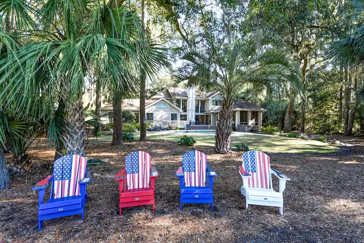 View of pool, deck area and large screen porch