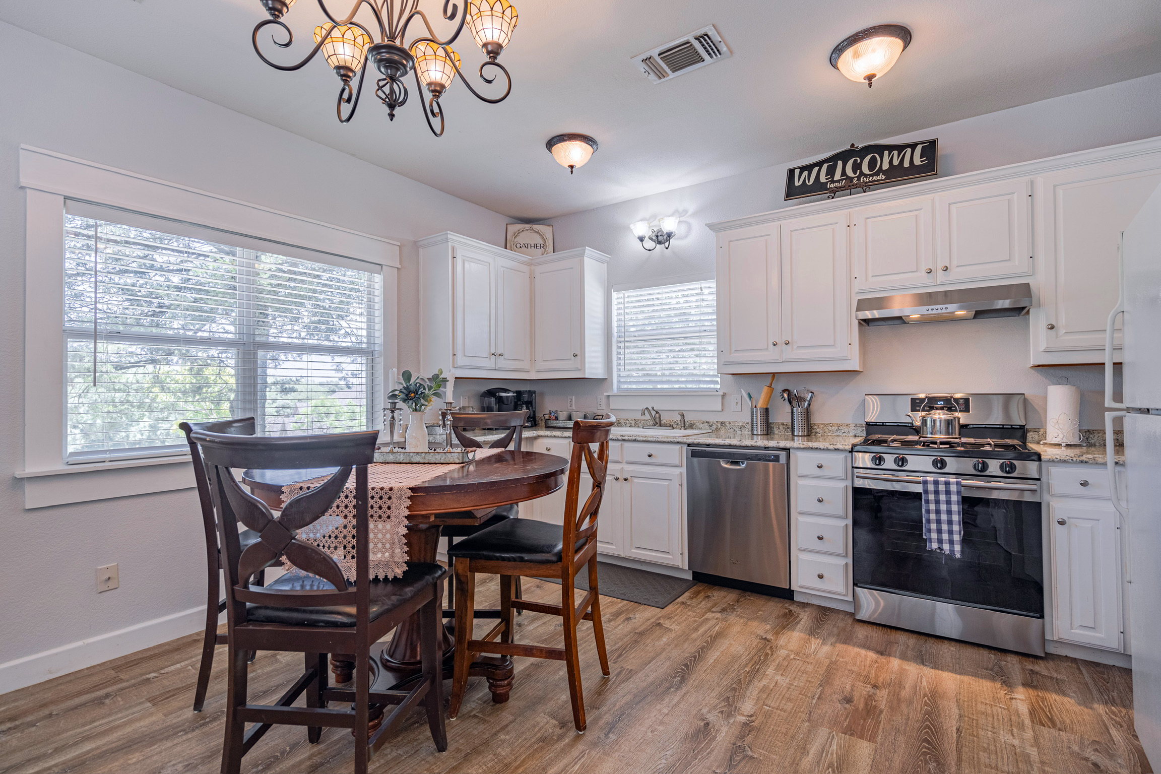 Cottage kitchen - stocked with dishes, utensils, and basic cookware