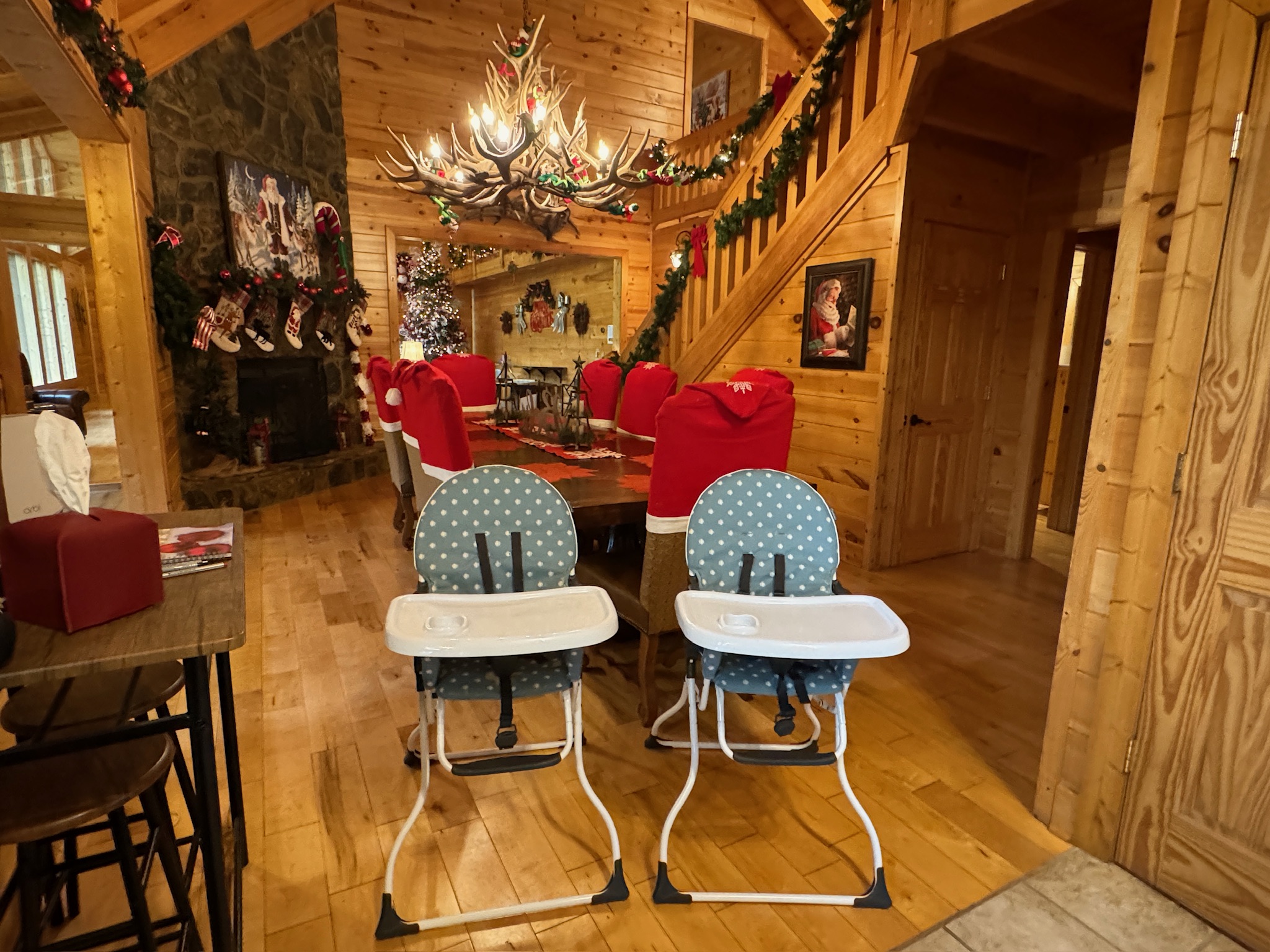 Two complimentary high chairs