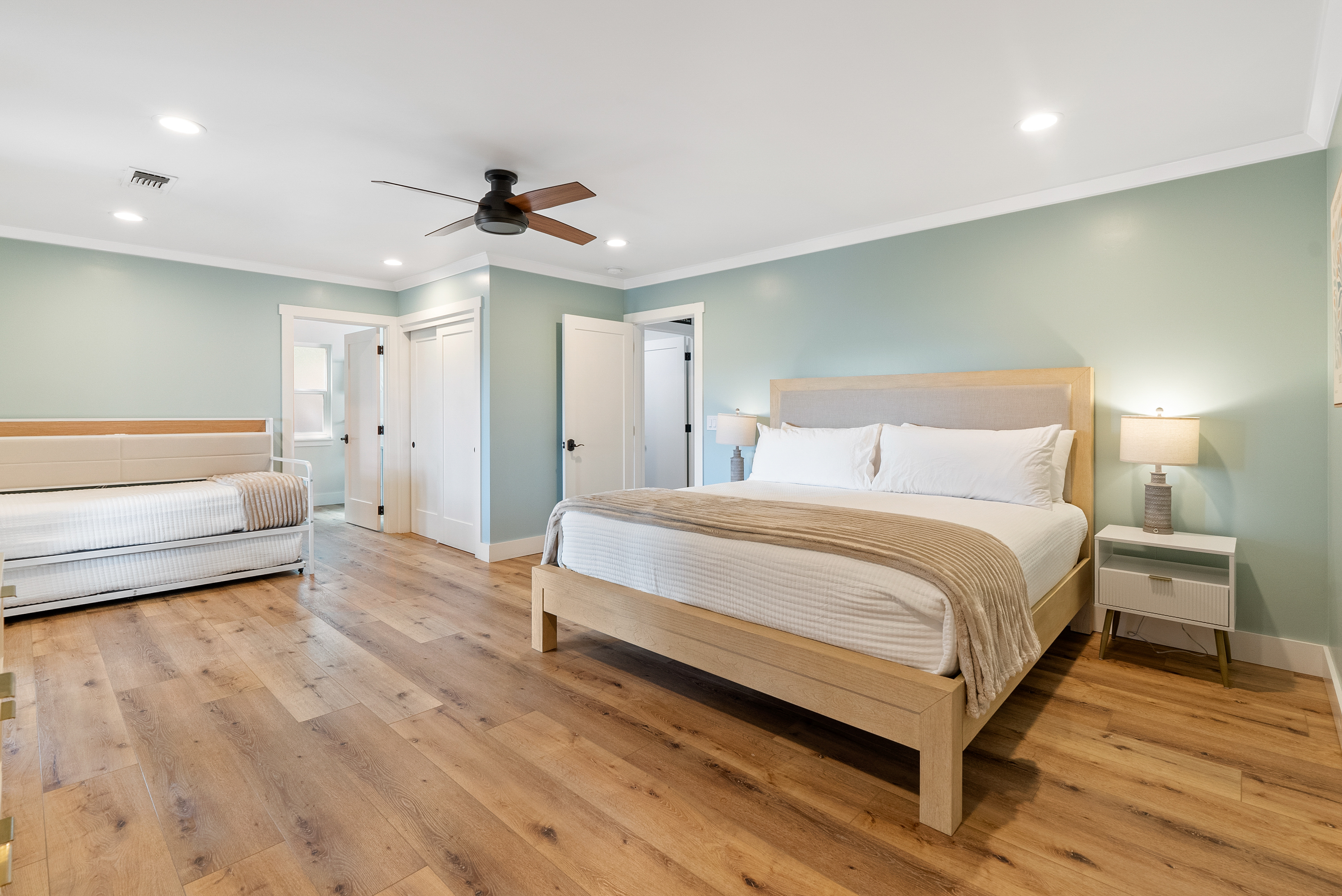 A spacious, light-filled room designed for a peaceful and restorative night.