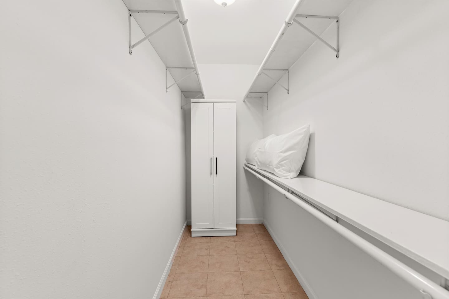 Pack light and enjoy the convenience of our spacious walk-in closet, a rare find that makes settling in a breeze. We keep this cabinet locked for owner's storage.