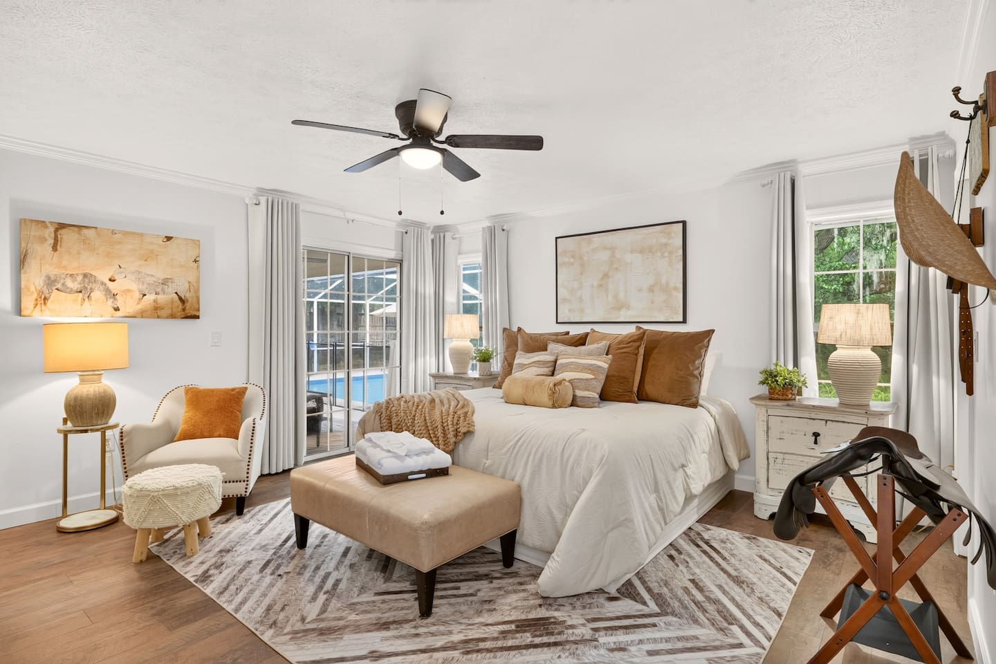 Welcome to the Saddlebrook Suite. A quick escape to the pool or a good book in the reading chair, this master suite has all you need to enjoy your stay and never want to leave!