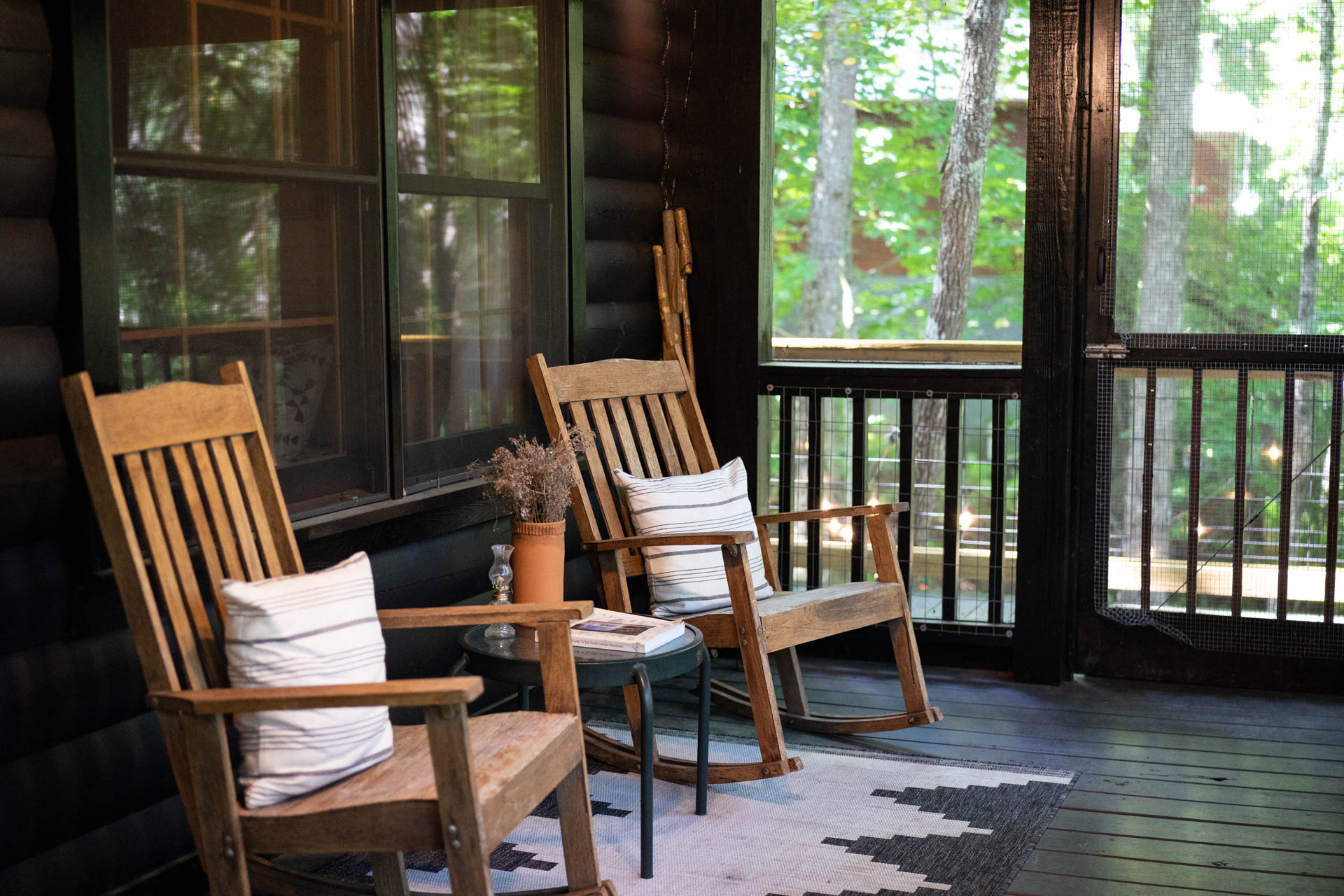 Relax in the rocking chairs on the screened porch