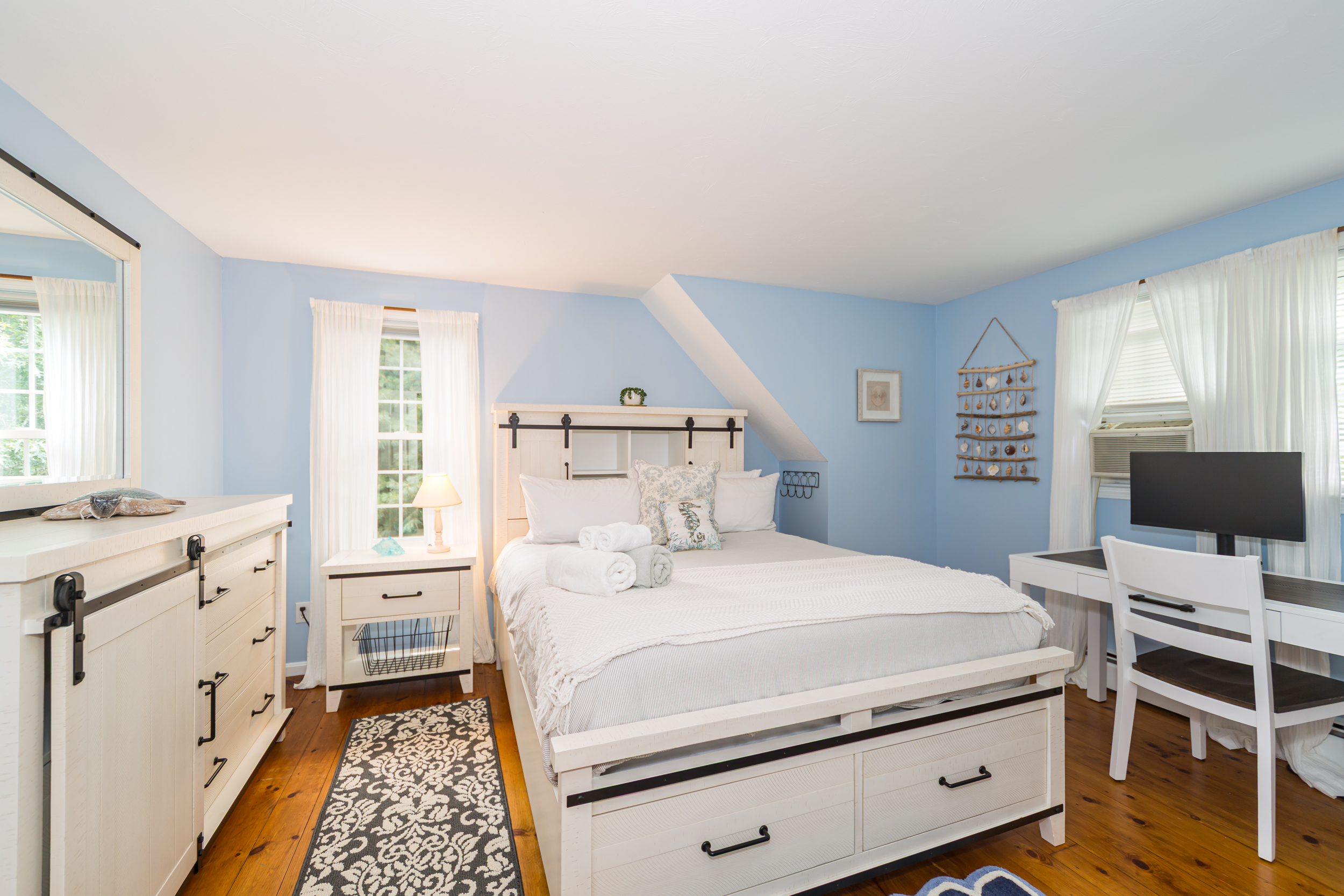 Our second queen bedroom with dedicated workspace