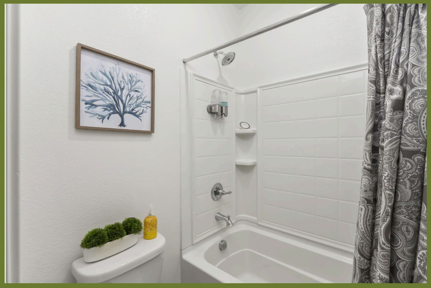Bathroom with shower/tub combination,  and clean essentials for daily routines.