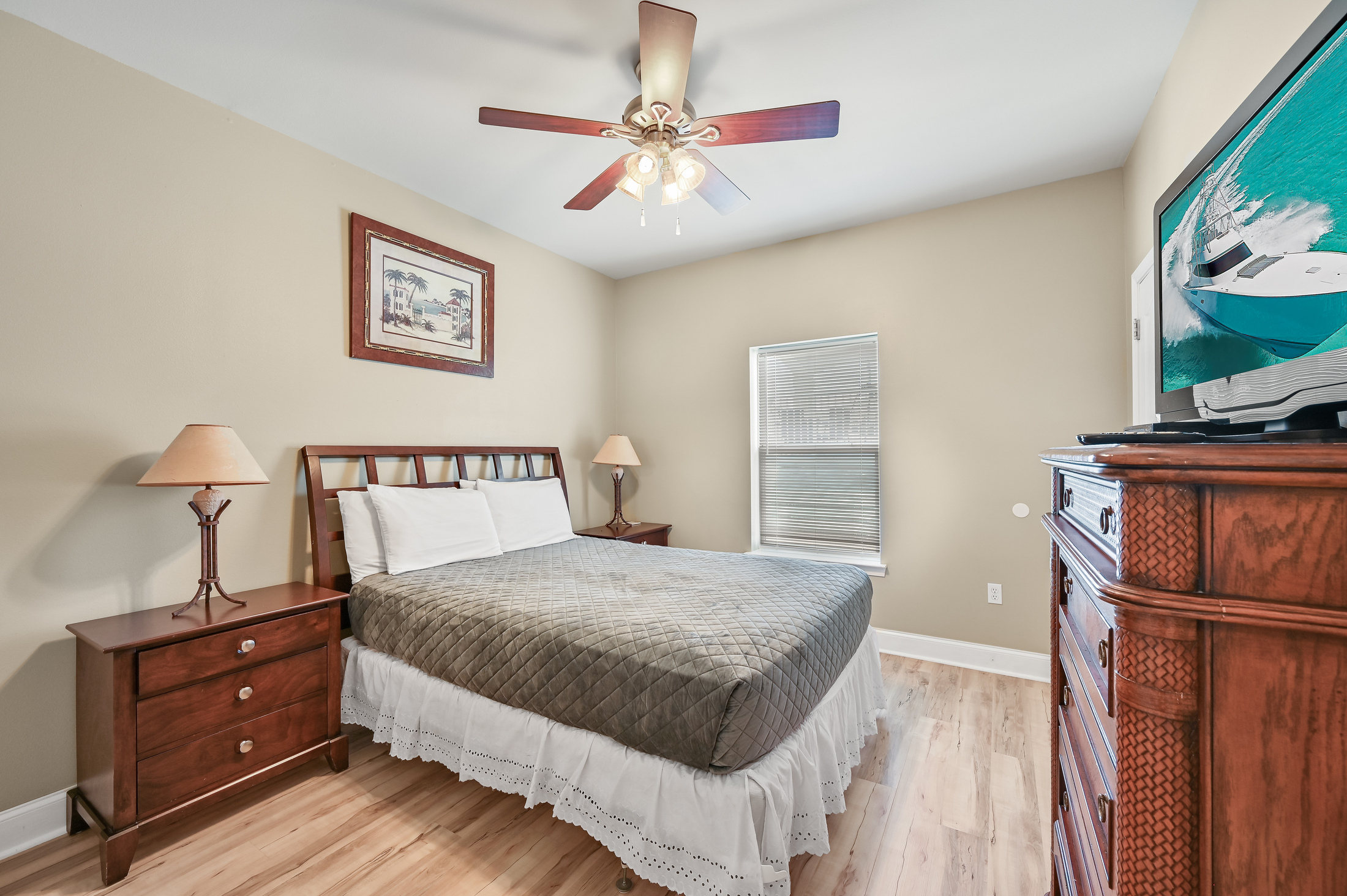 BEDROOM #5 + BATHROOM #5: Queen Bed with night stands, dresser, and TV. This bedroom has a private b
