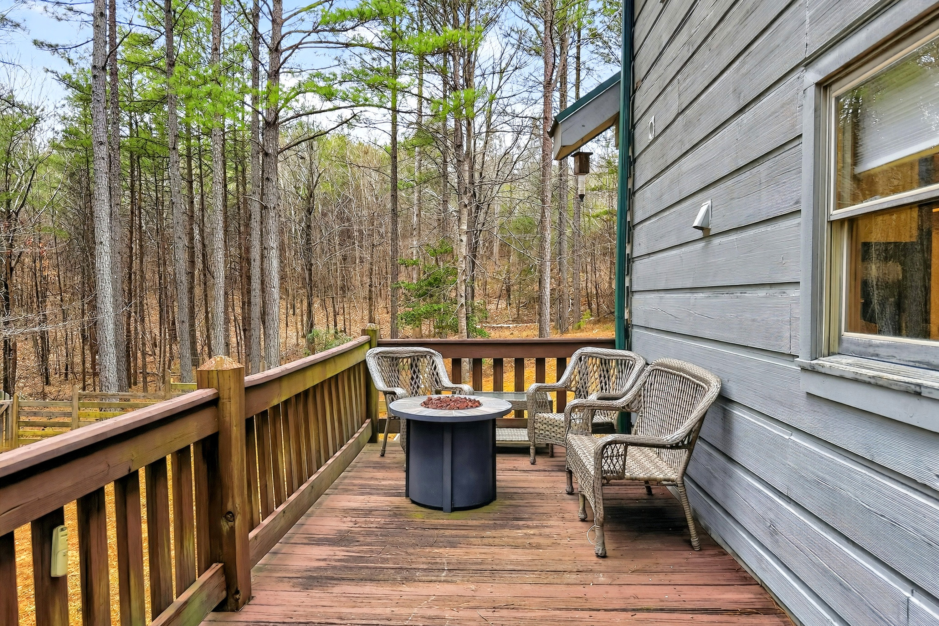 Gather around the has fire pit