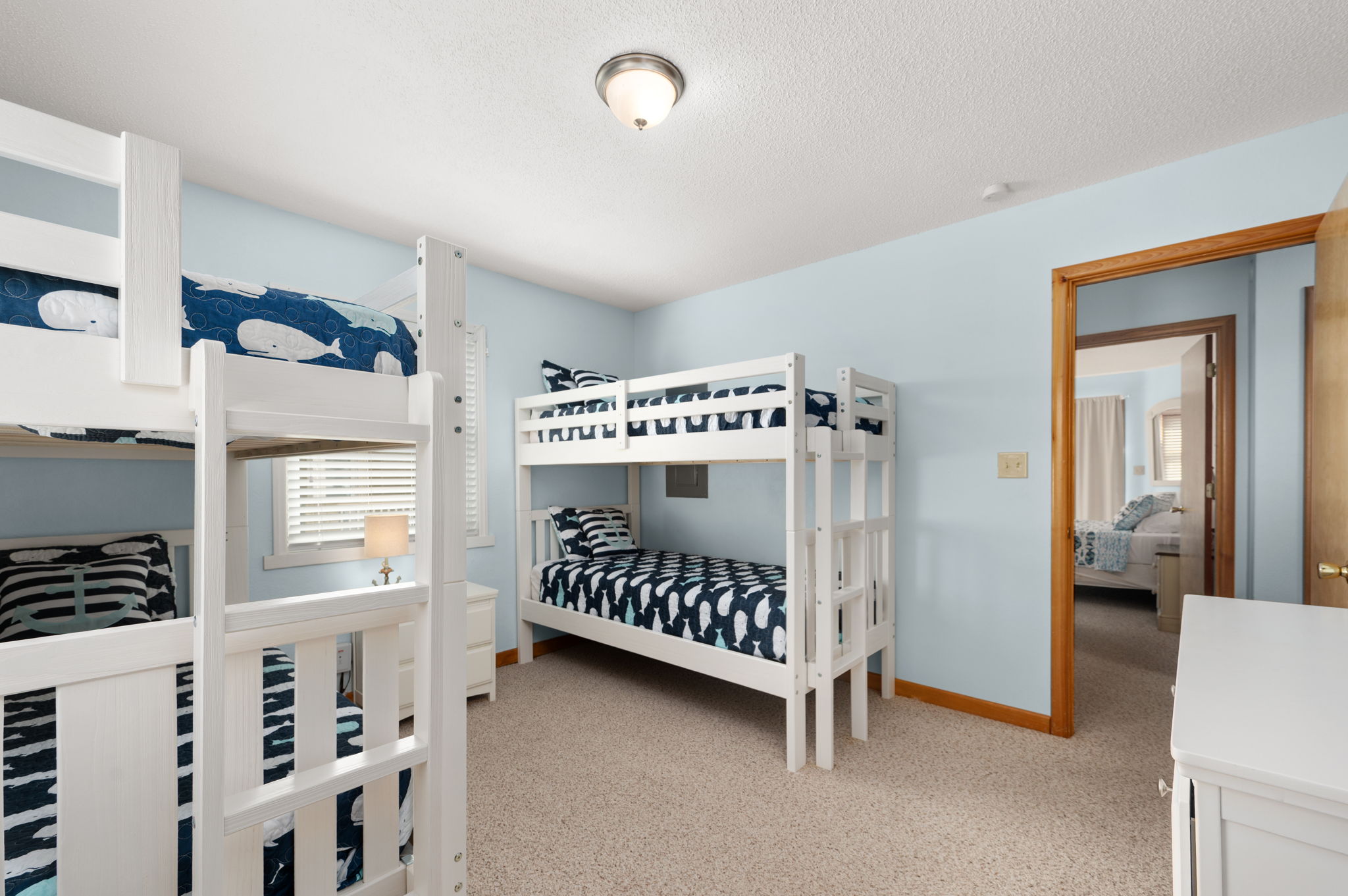 Bunk room with 4 single beds