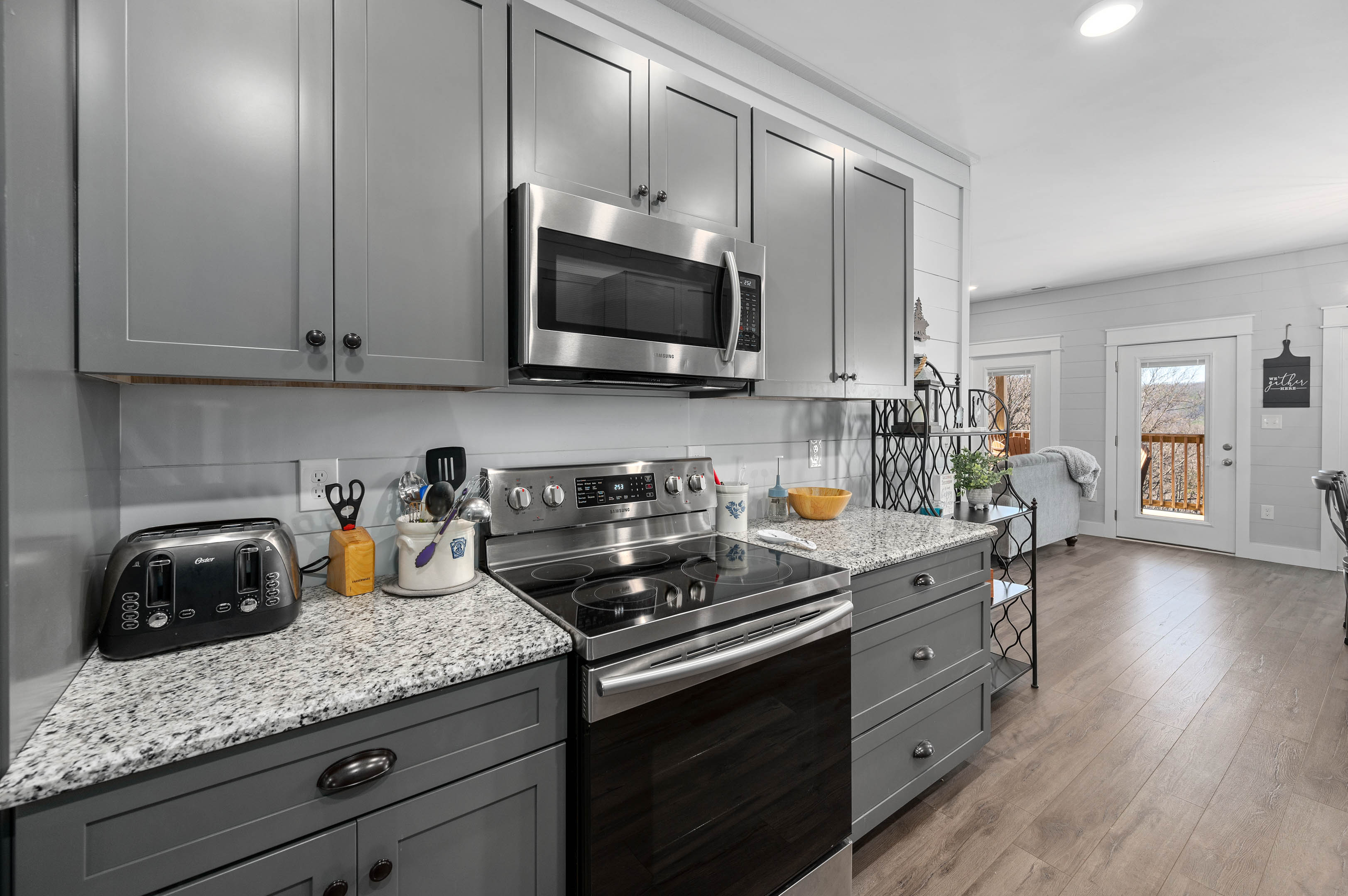 Stove and microwave in kitchen