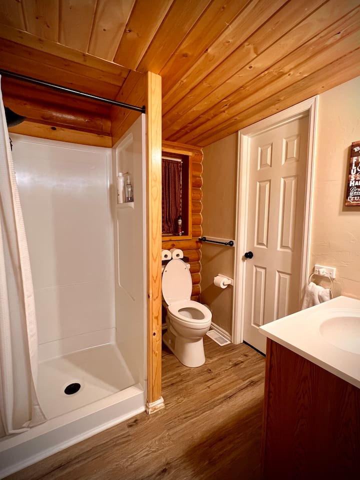 Centrally located to the entire cabin is this 3/4 bath on the main floor.