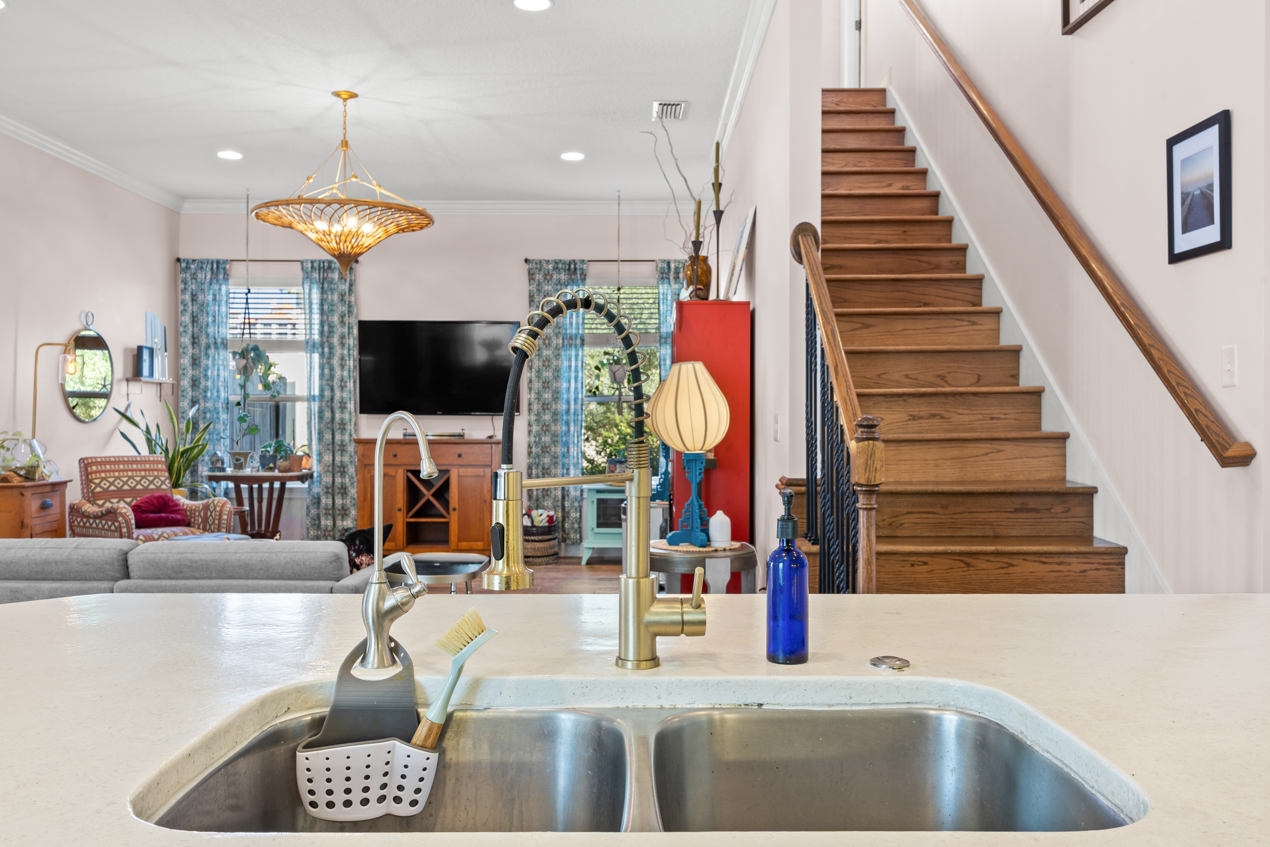 Bright kitchen overlooking the living area — perfect for cooking while staying connected.