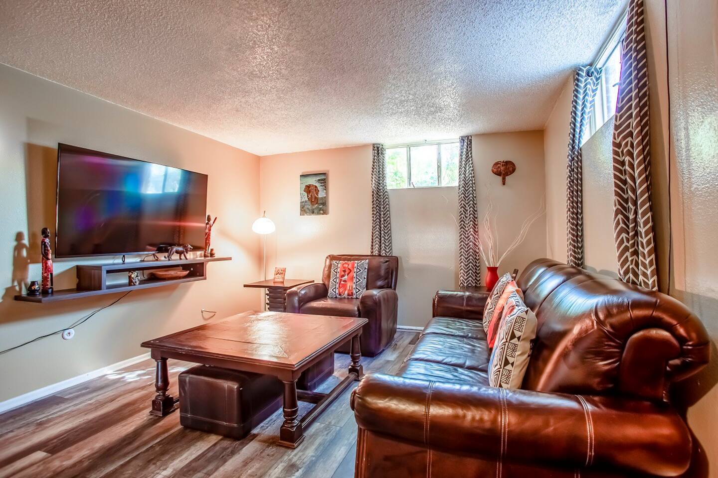 Lots of lighting in this Garden Level Suite.