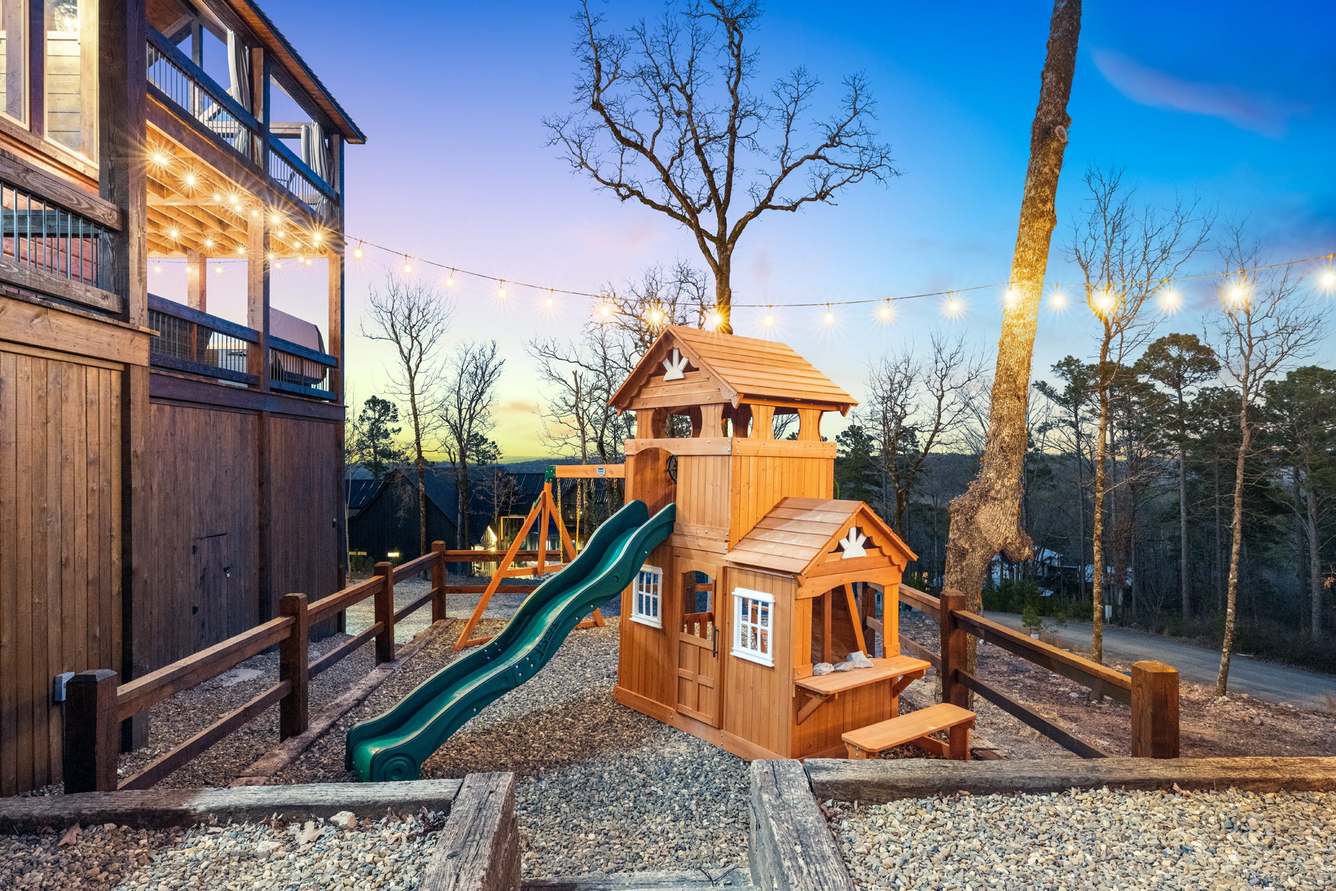 Family-friendly outdoor play area featuring a charming wooden playground