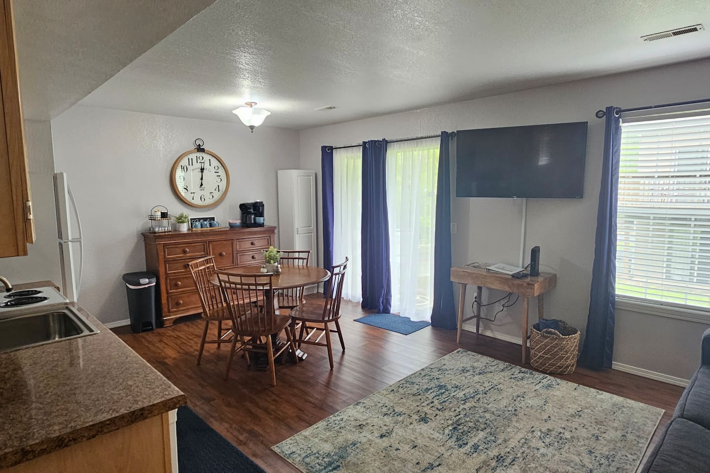 Open concept living room, dining, and kitchen. 