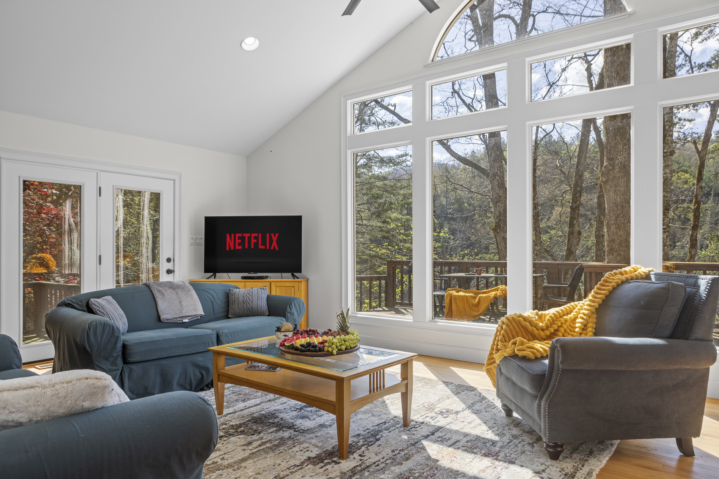 Living Area: Spacious retreat with panoramic views, perfect for movie nights and relaxation!