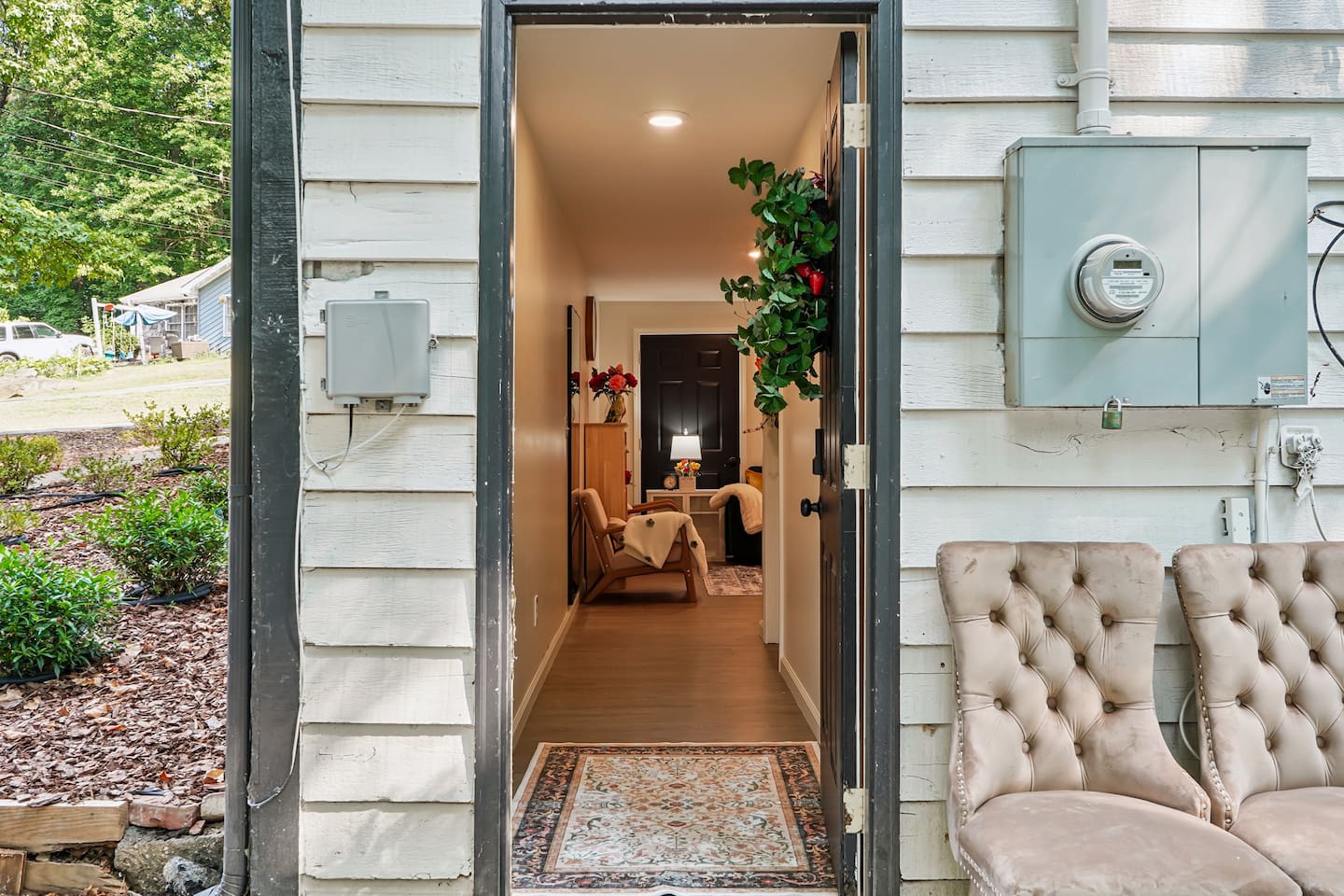 This door is located on the lower level of the triplex to the right hand side of the first picture 
