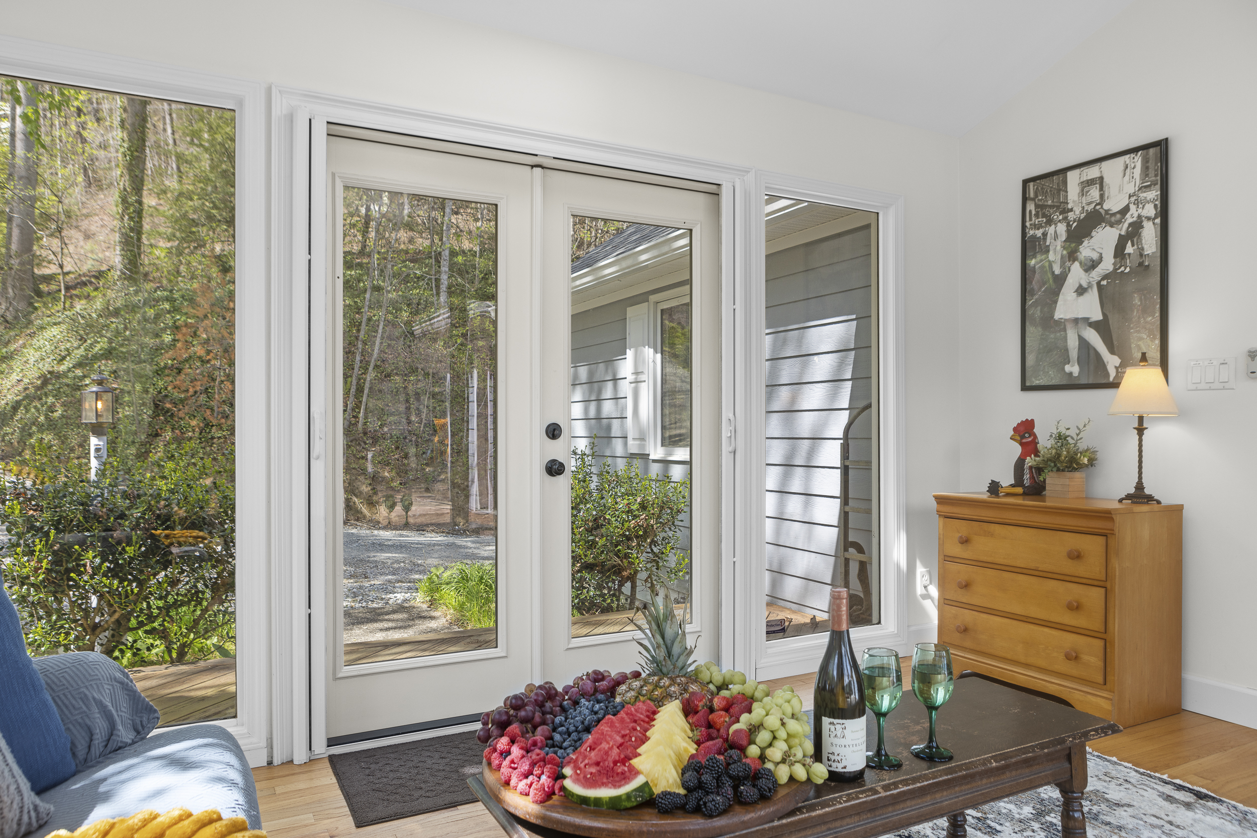 Sun Room: Bright and inviting space welcomes you with fresh fruit, wine, and nature's beauty!