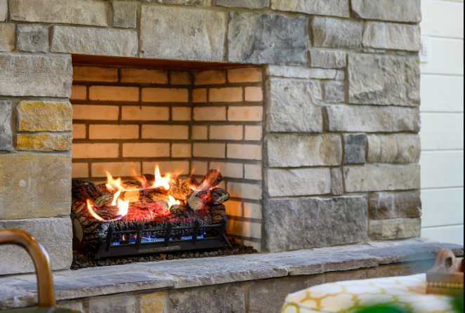Warm indoor fireplace for a cozy cabin experience