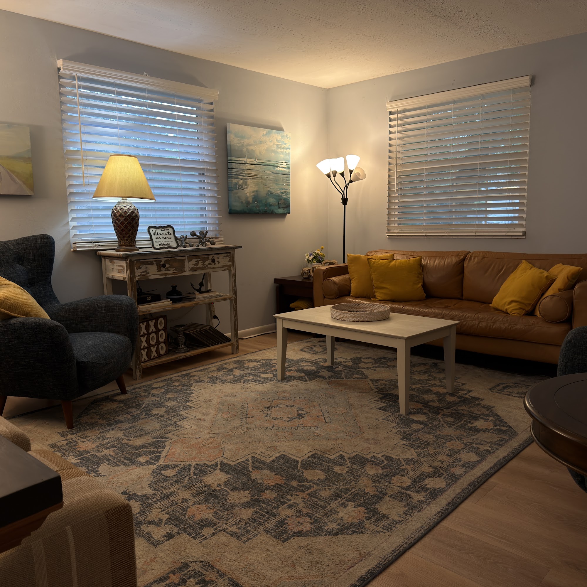 Living room with leather sofa and lots of natural light