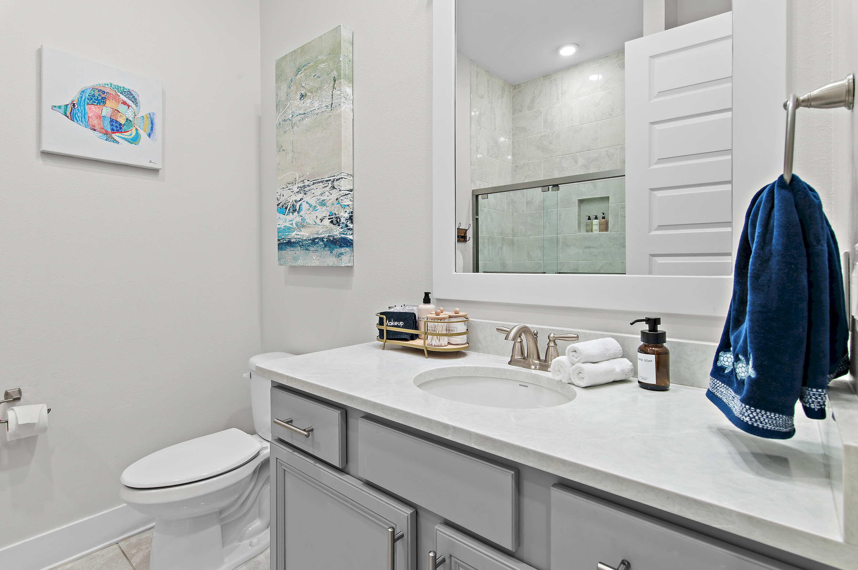 Guest Bathroom: Modern, full-featured bathroom located conveniently outside the bunk room and guest bedroom, providing easy access and privacy for all guests on the floor.