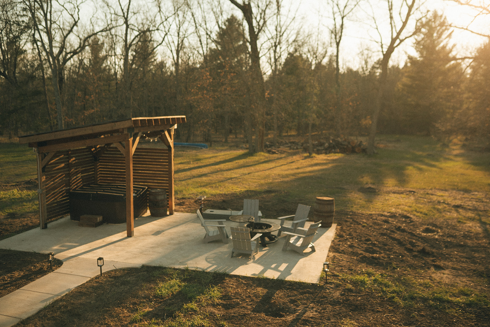 Patio with firepit and hot tub
