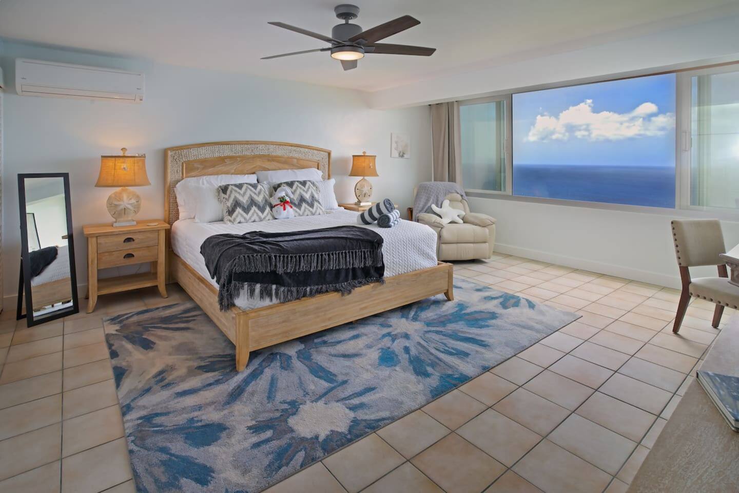 Spacious bedroom with king bed and panoramic views