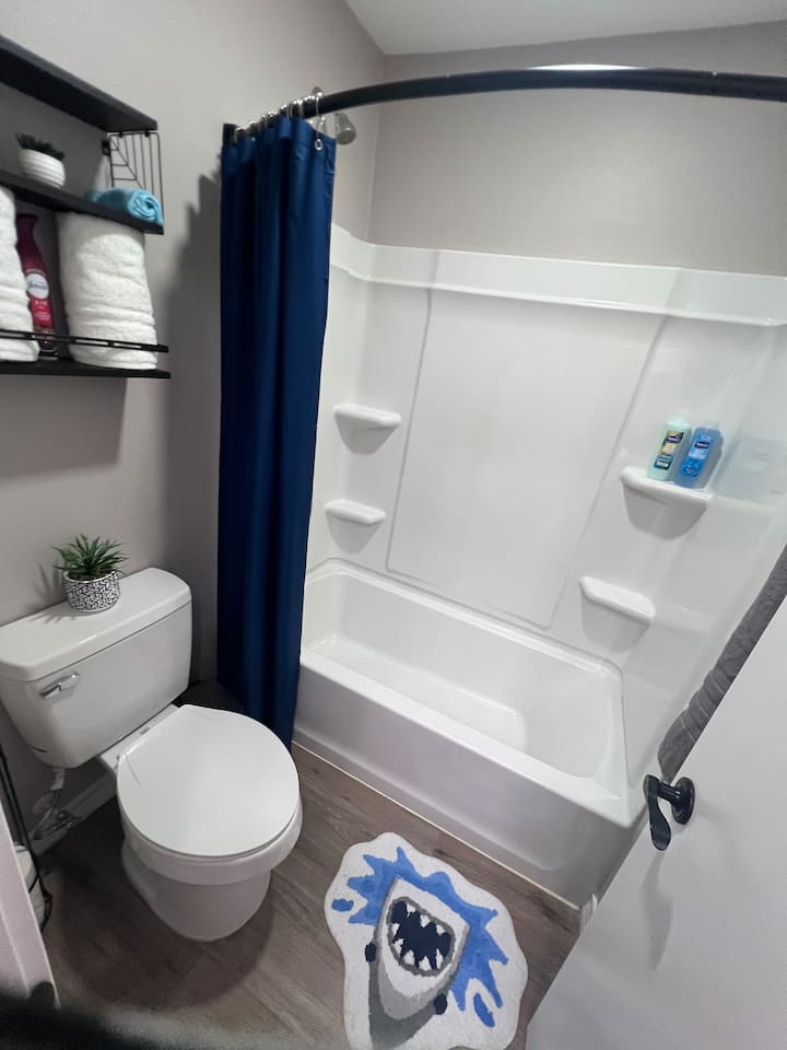 Bathroom with a shower/tub combo
