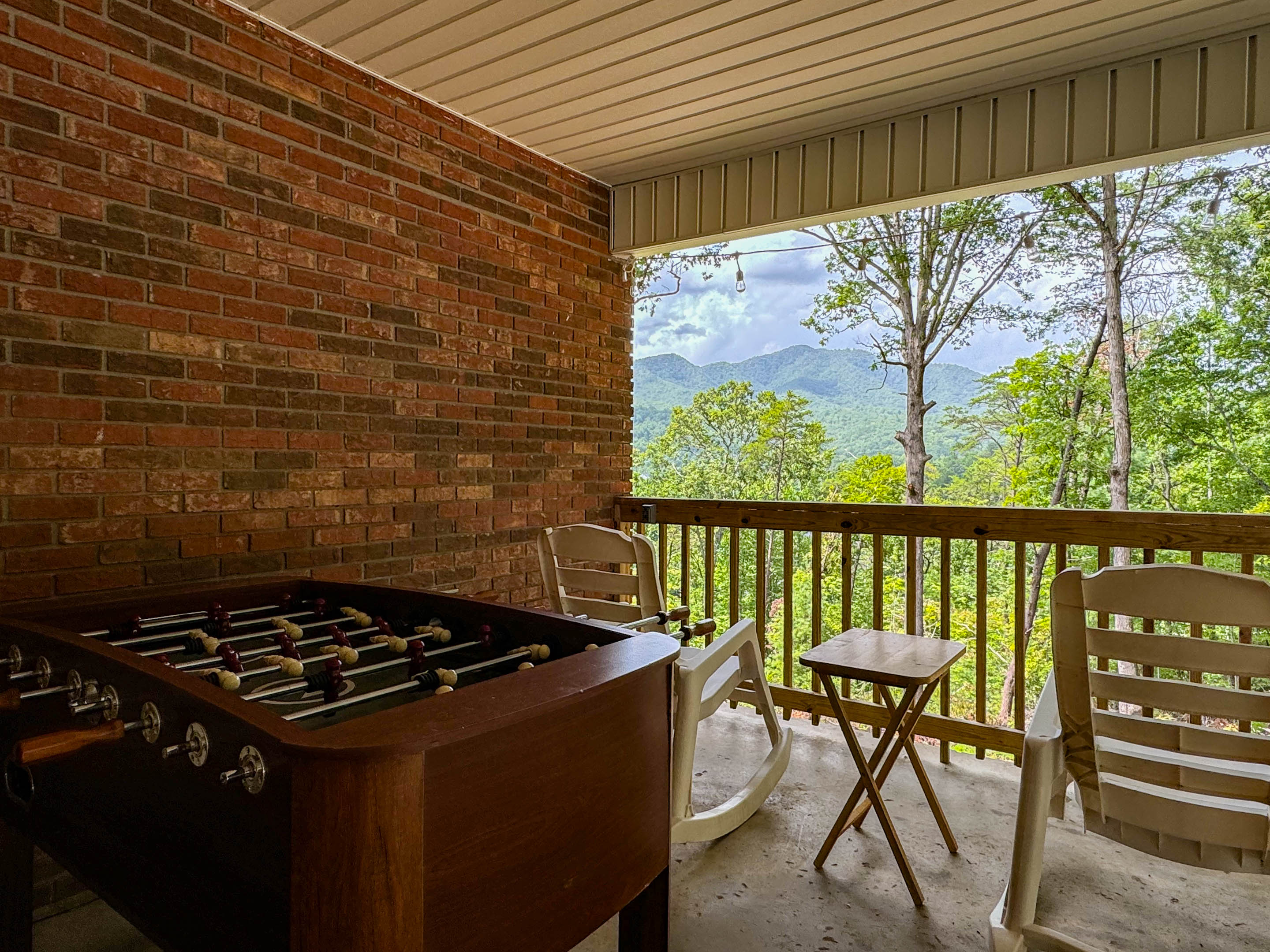The carport is a great amenity for the property! Perfect to enjoy the fog roll through the Deep Creek Valley or an evening storm pass by. There is also a foosball table for guests to use!