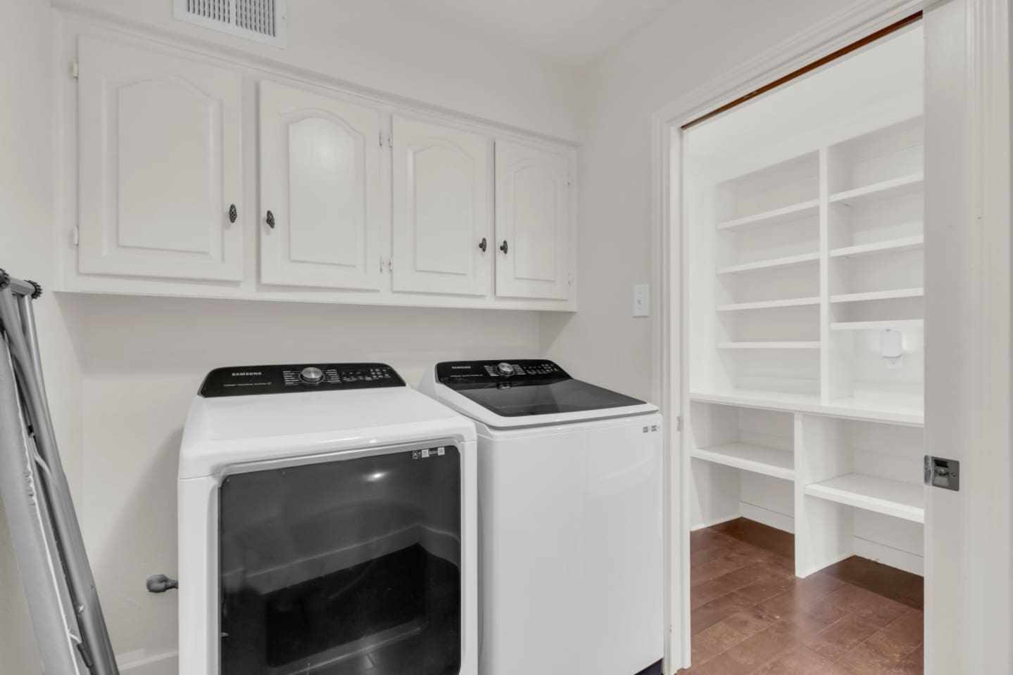 Utility room with in-unit washer and dryer available at no additional cost, providing added convenience for longer stays, family travel, and everyday laundry needs.